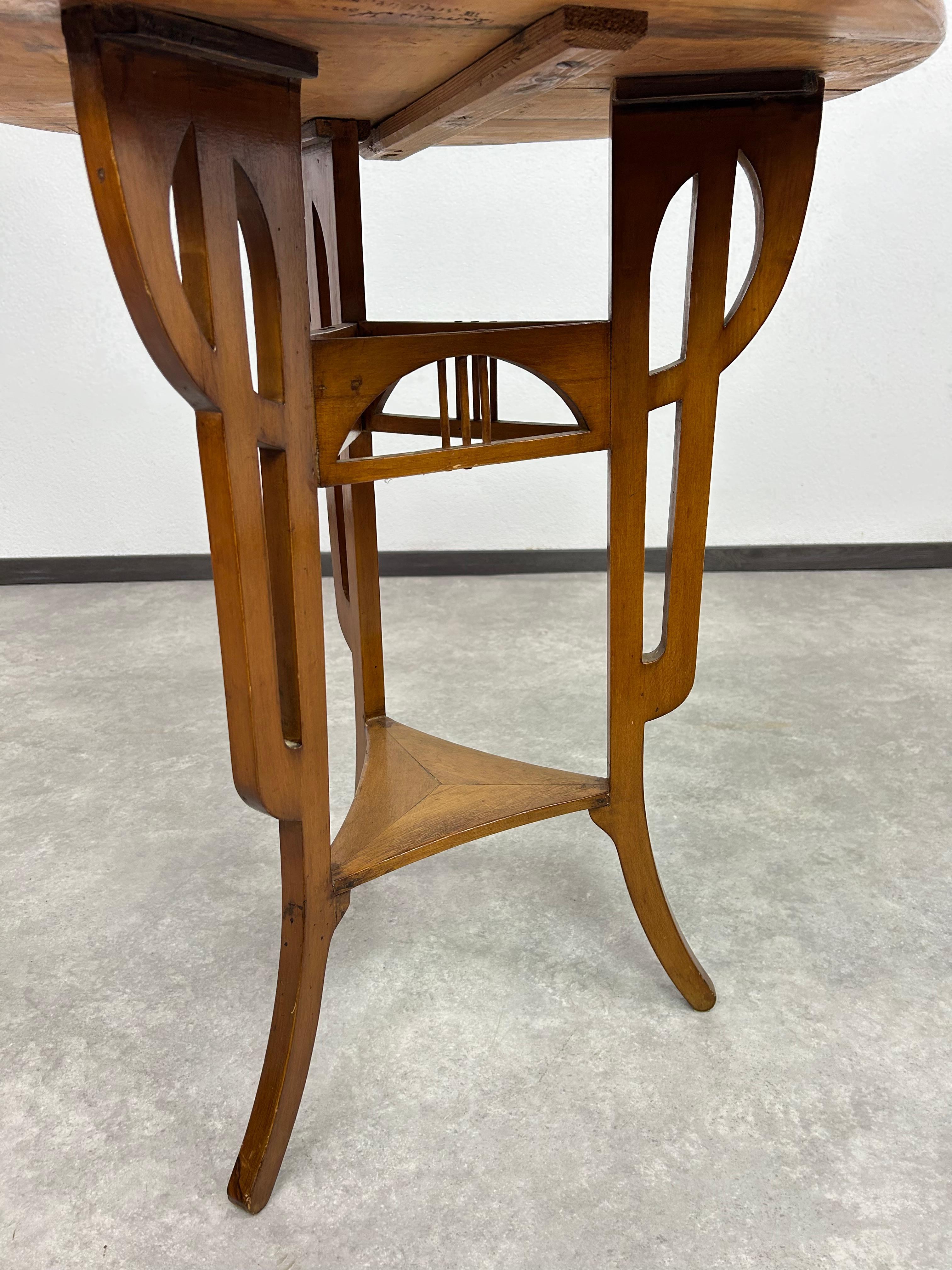 Wood Round art nouveau coffee table with carved top For Sale