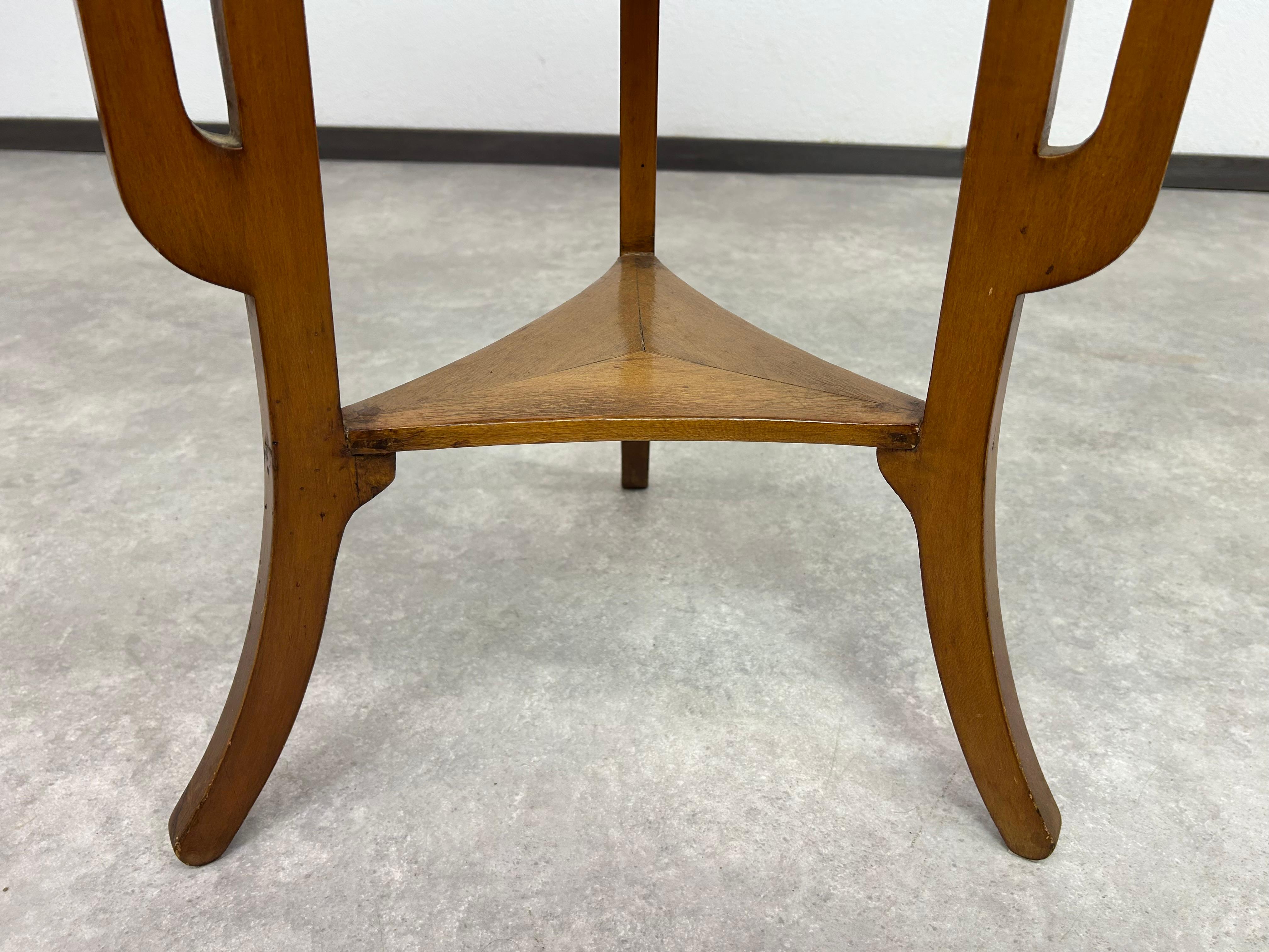 Round art nouveau coffee table with carved top For Sale 2