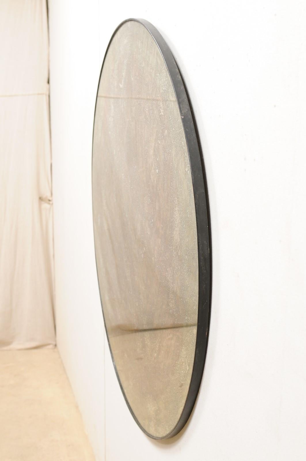 round antiqued mirror