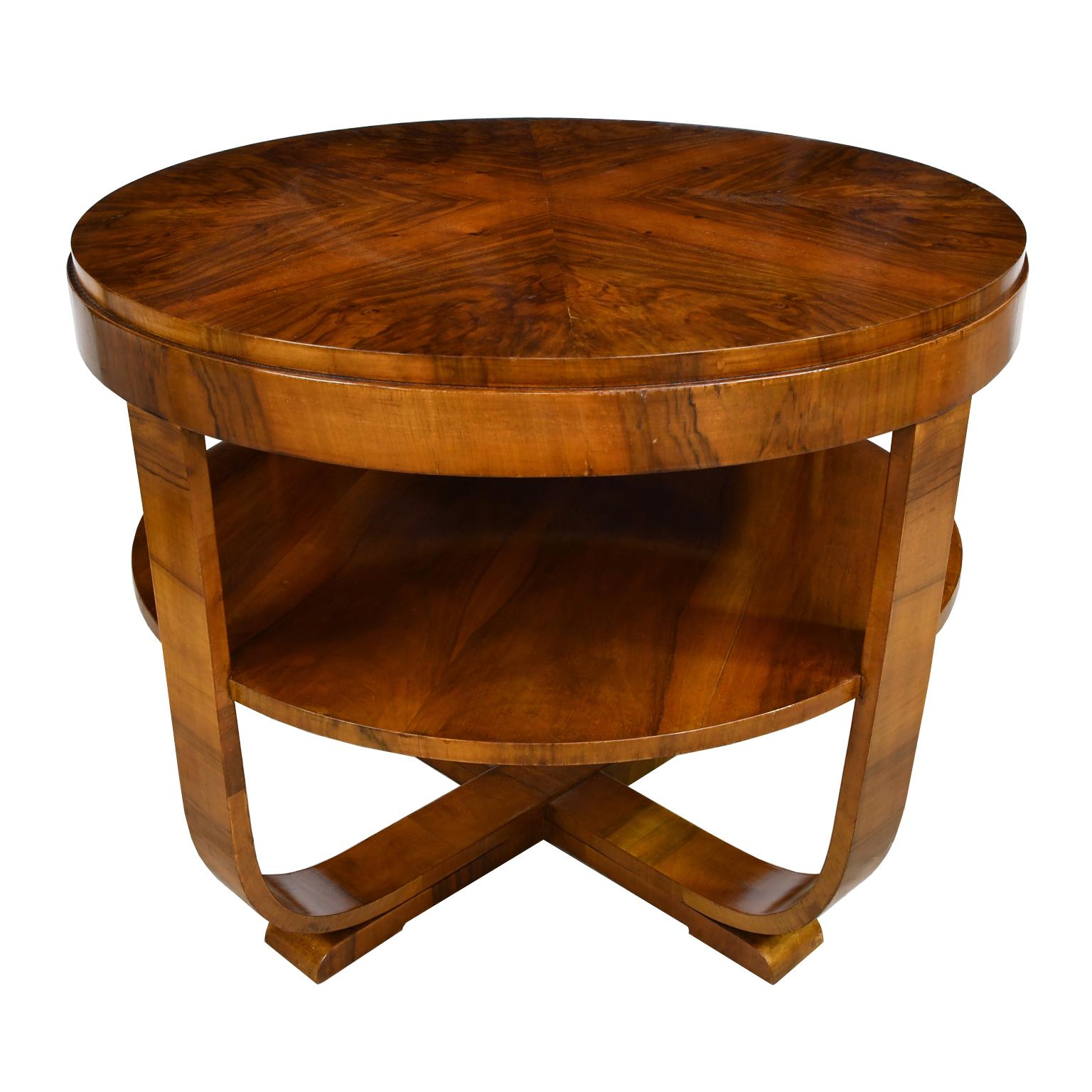 A very handsome Austrian Art Deco table with round top designed to create an 