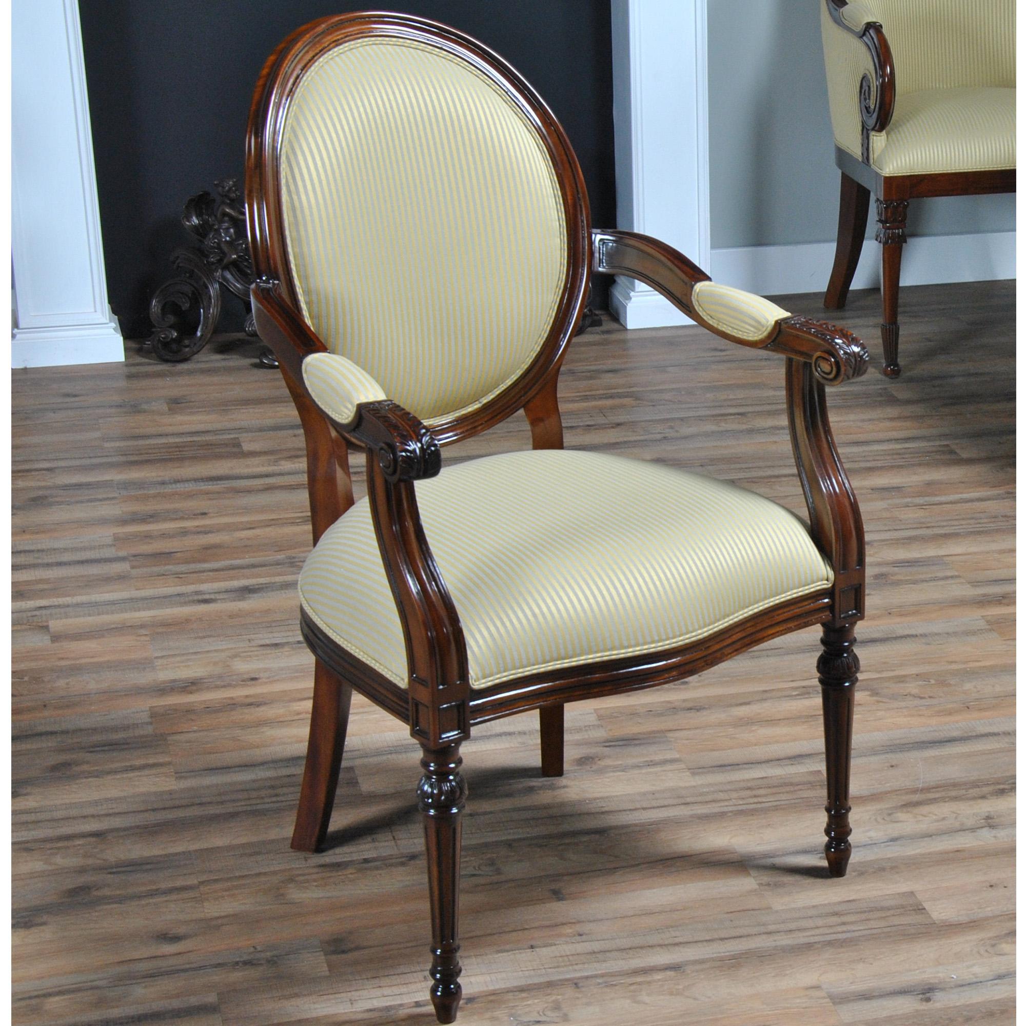 A set of ten Round Back Mahogany Chairs with 2 arm chairs and 8 side chairs. These high quality dining chairs are hand made from kiln dried solid mahogany. Neutrally upholstered in our most popular fabric these chairs are restrained in their design