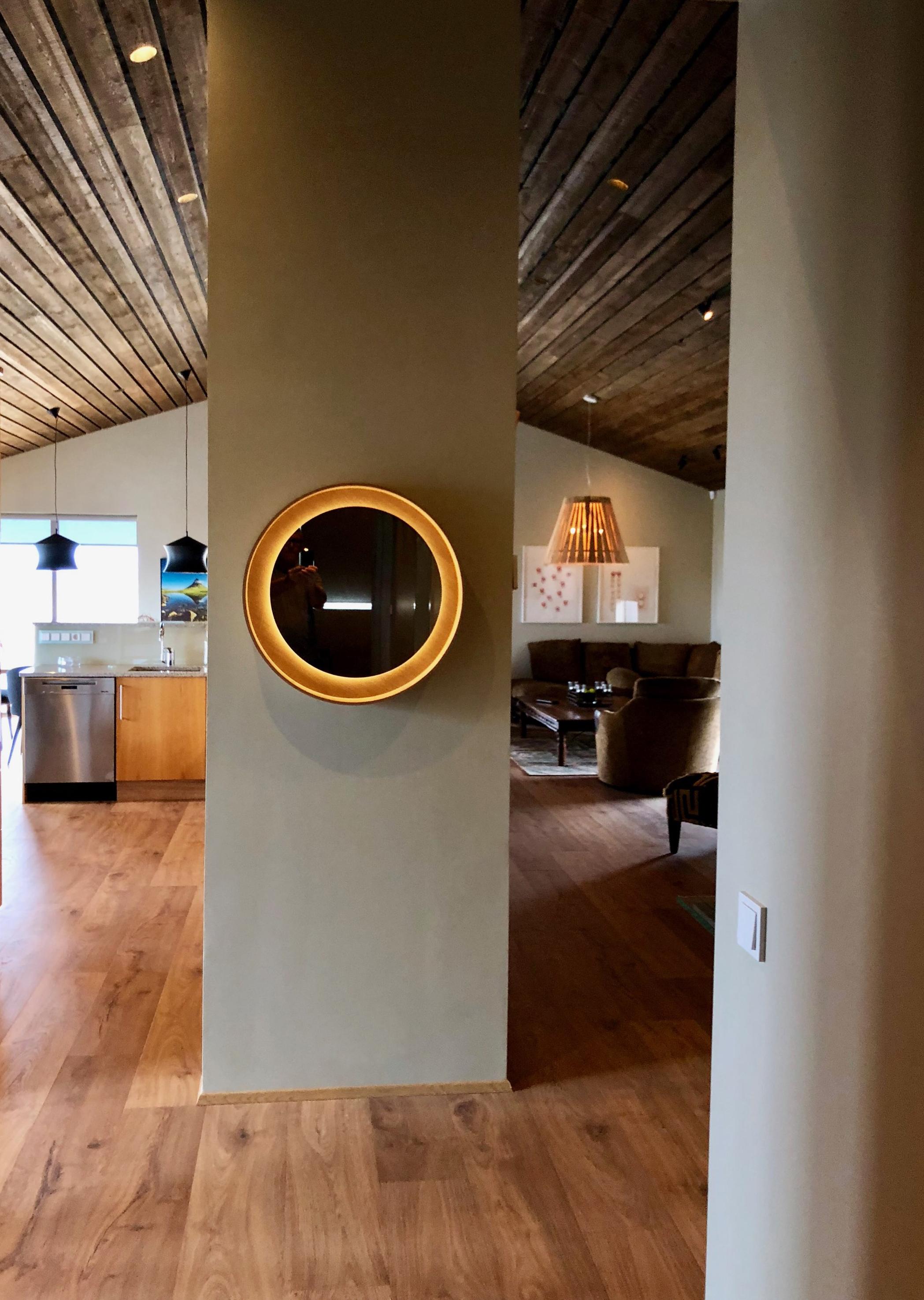 Round backlit wall mirror with LED light in Oak. dims on rotation
This Halo mirror collection is available in 2 sizes and 3 wood finishes (Ash, Oak and Walnut) and in any color finishes.

Dimension:
Ø26” / Ø66cm

Materials:
veneer in oak,