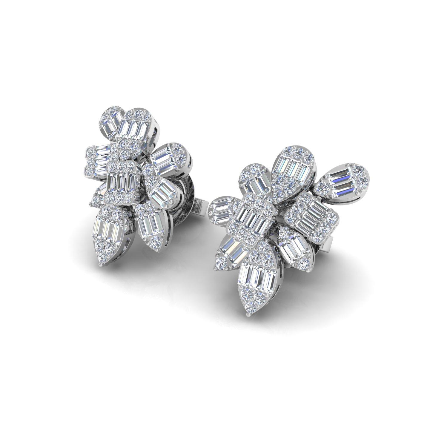 Discover timeless elegance with these Round Baguette Diamond Earrings, crafted in luxurious 18 Karat White Gold. Featuring 1.1 carats of dazzling natural diamonds with an average clarity of SI1-SI2 and a color grade of H-I, these earrings offer a