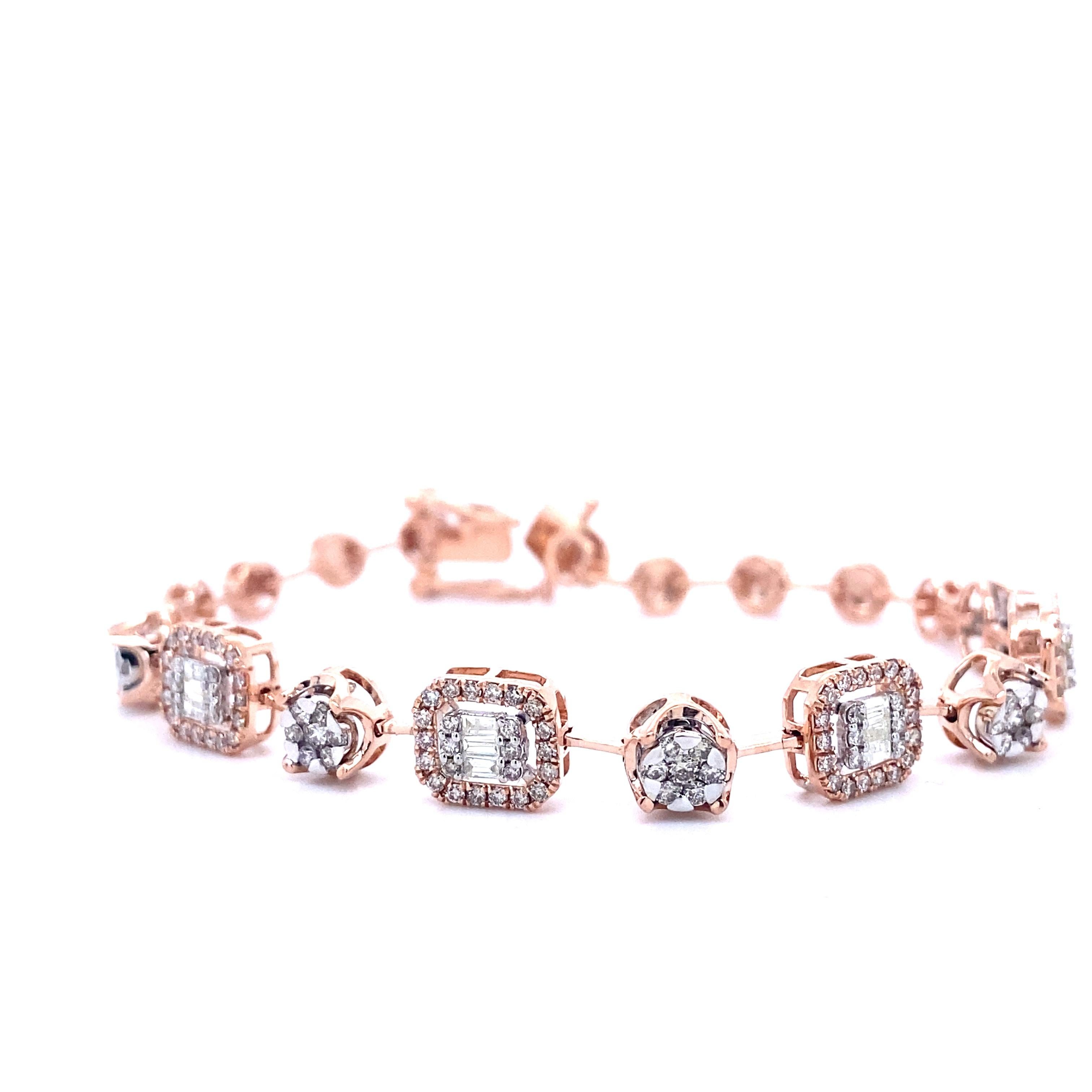 The Round & Baguette Diamond bracelet With Illusion Setting is crafted from 18k solid gold. It is composed of a series of ornate links, each adorned with diamonds, giving the piece a sparkling and sophisticated look. The central stones are