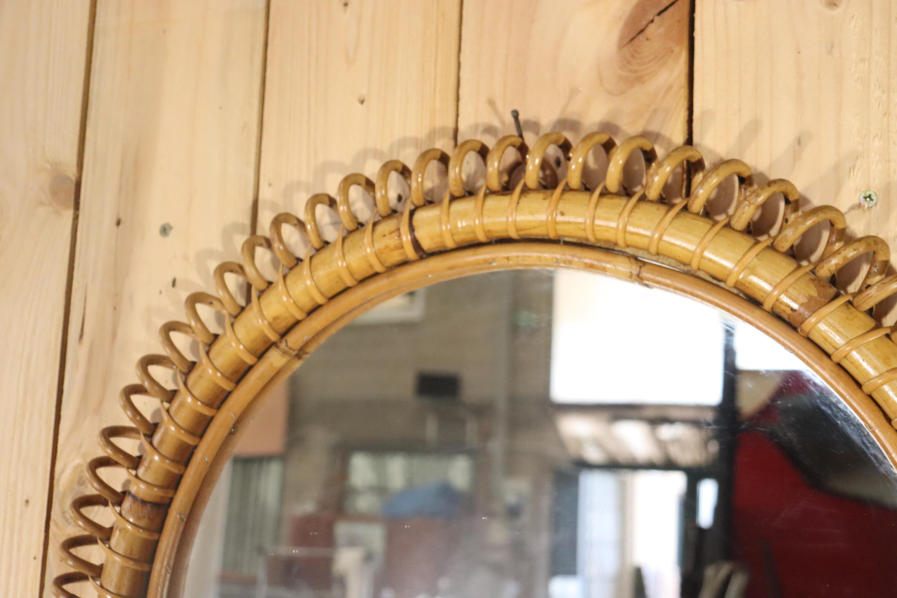 large round mirror by Italian designer Franco Albini, in rattan and bamboo, very good condition