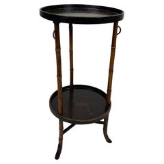 Used Round bamboo table with decorations, Asian art.
