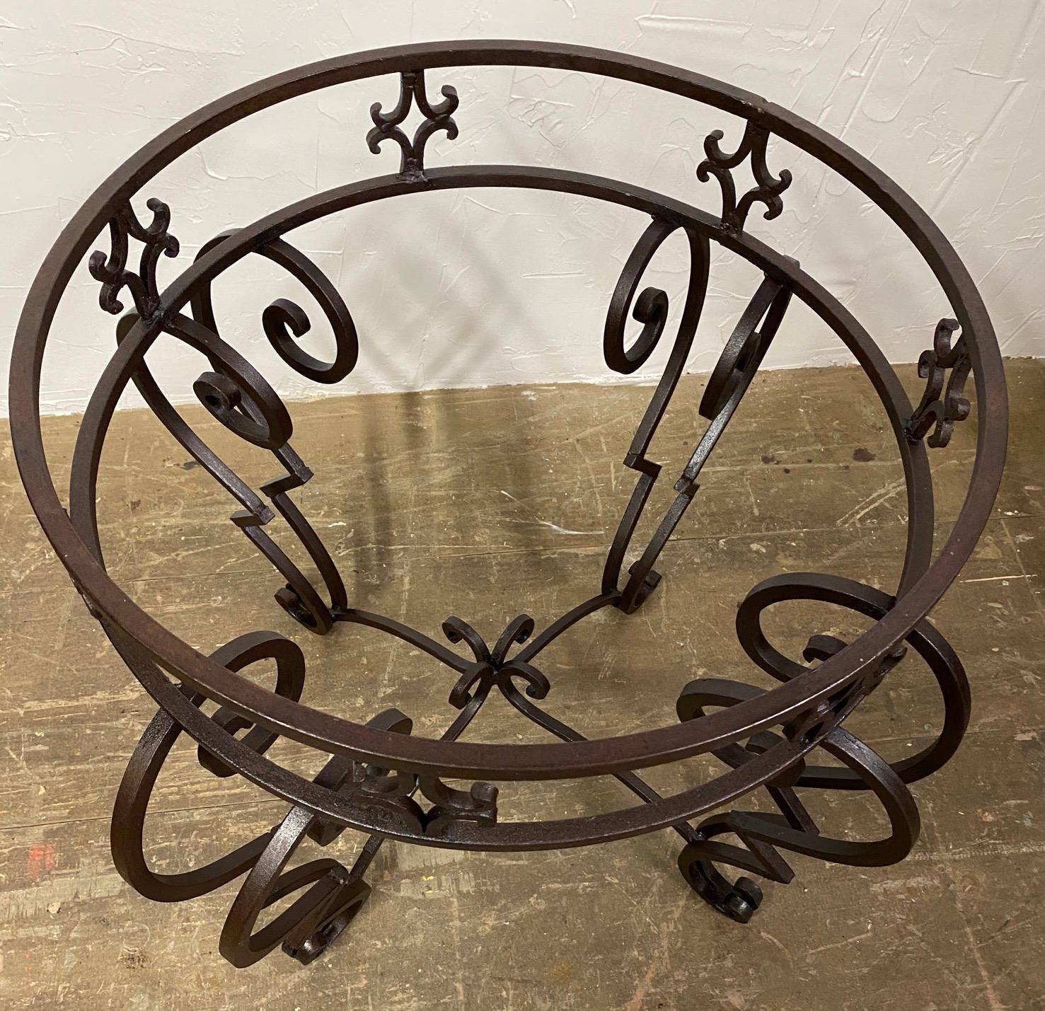 glass and wrought iron dining table