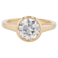 Round Bezel Diamond Yellow Gold Engagement Ring