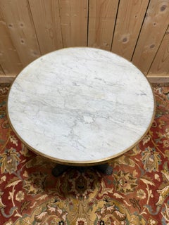 Round bistro guéridon in cast iron and marble