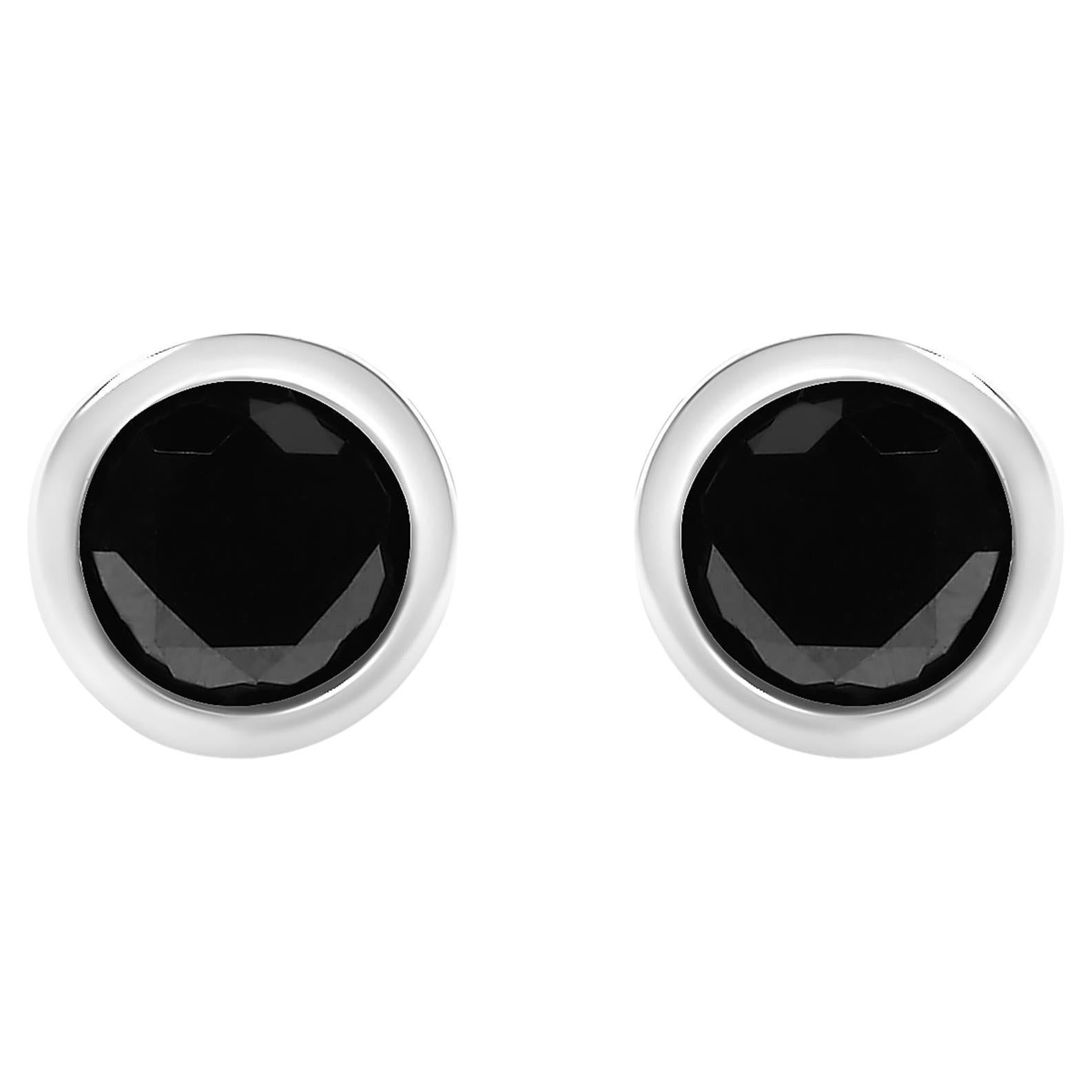 Orecchini a perno con solitario d'argento con diamante nero rotondo incastonato e fondelli a vite