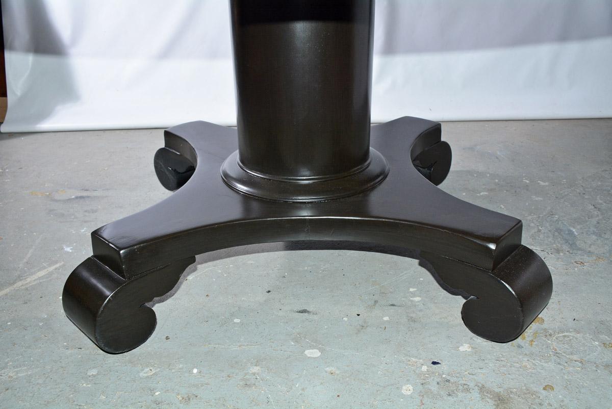 black round pedestal dining table