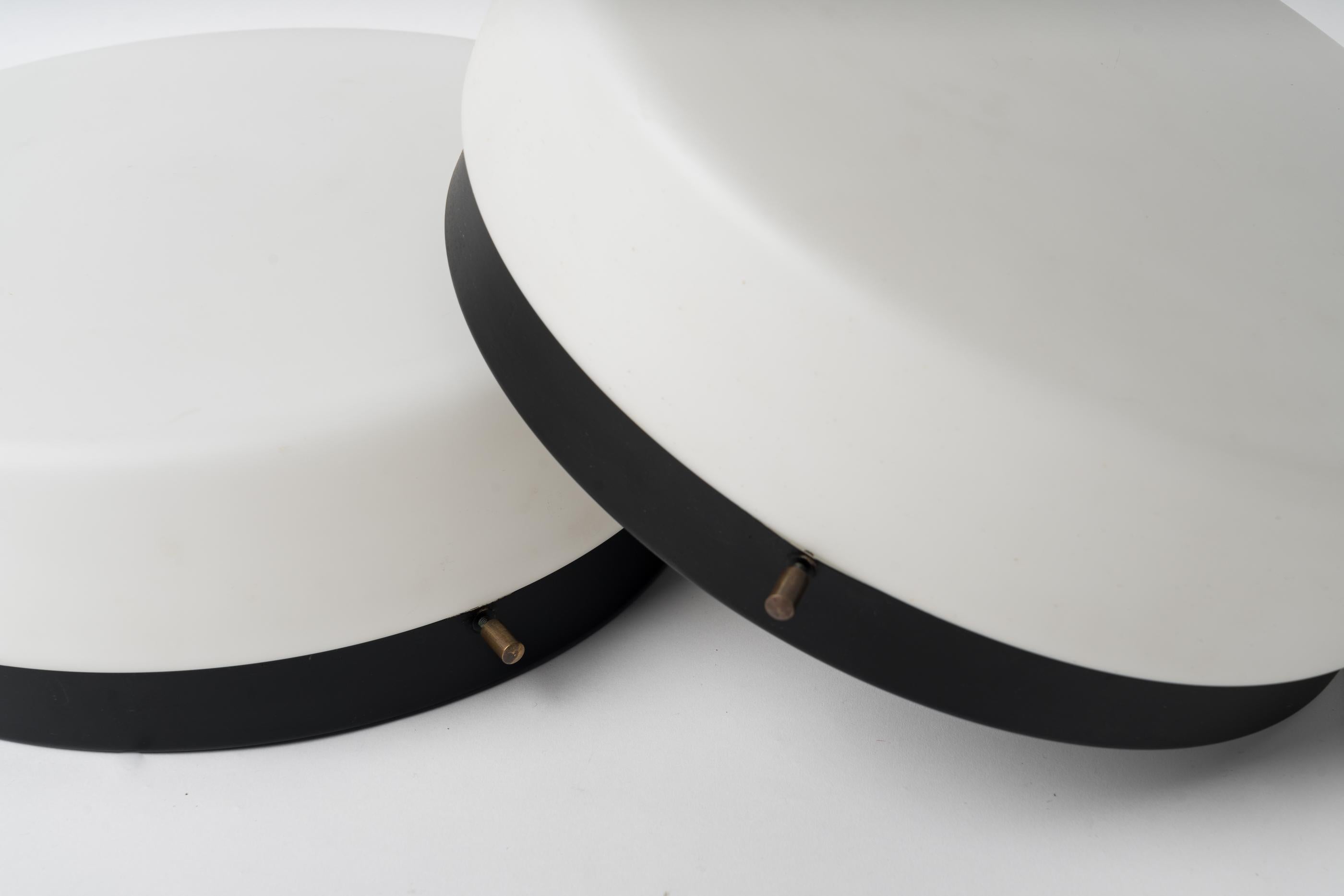 Mid-20th Century Round Black Lacquered Metal, Brass and Milk Glass Sconces, France 1960s For Sale