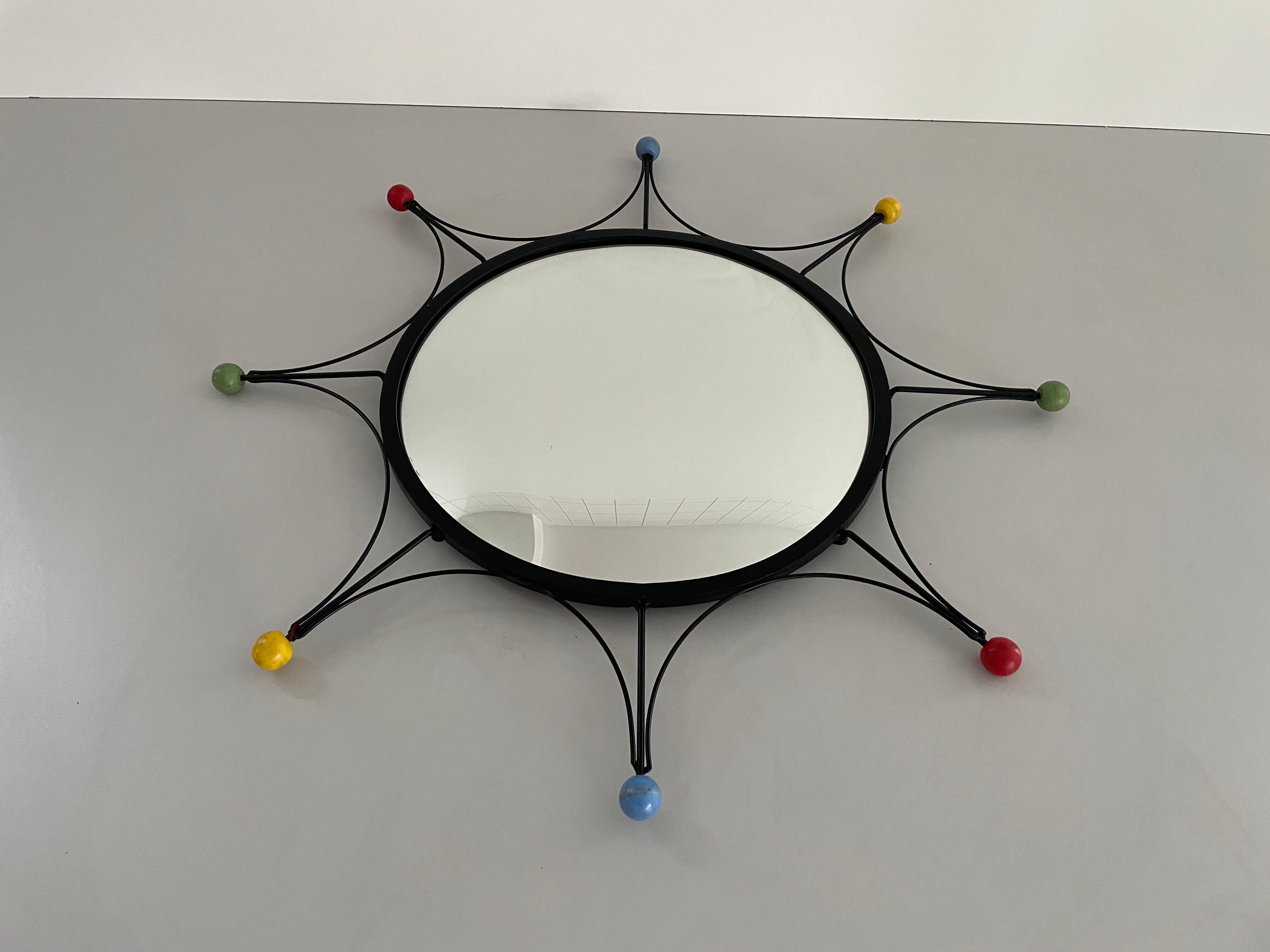 Round Black Metal Atomic Style Wall Mirror, 1980s, France

It is very ideal and suitable for all living areas.

No damage, no crack.
Wear consistent with age and use.

Measurements: 
Diameter: 69 cm
Mirror diameter: 41 cm
Depth: 3 cm