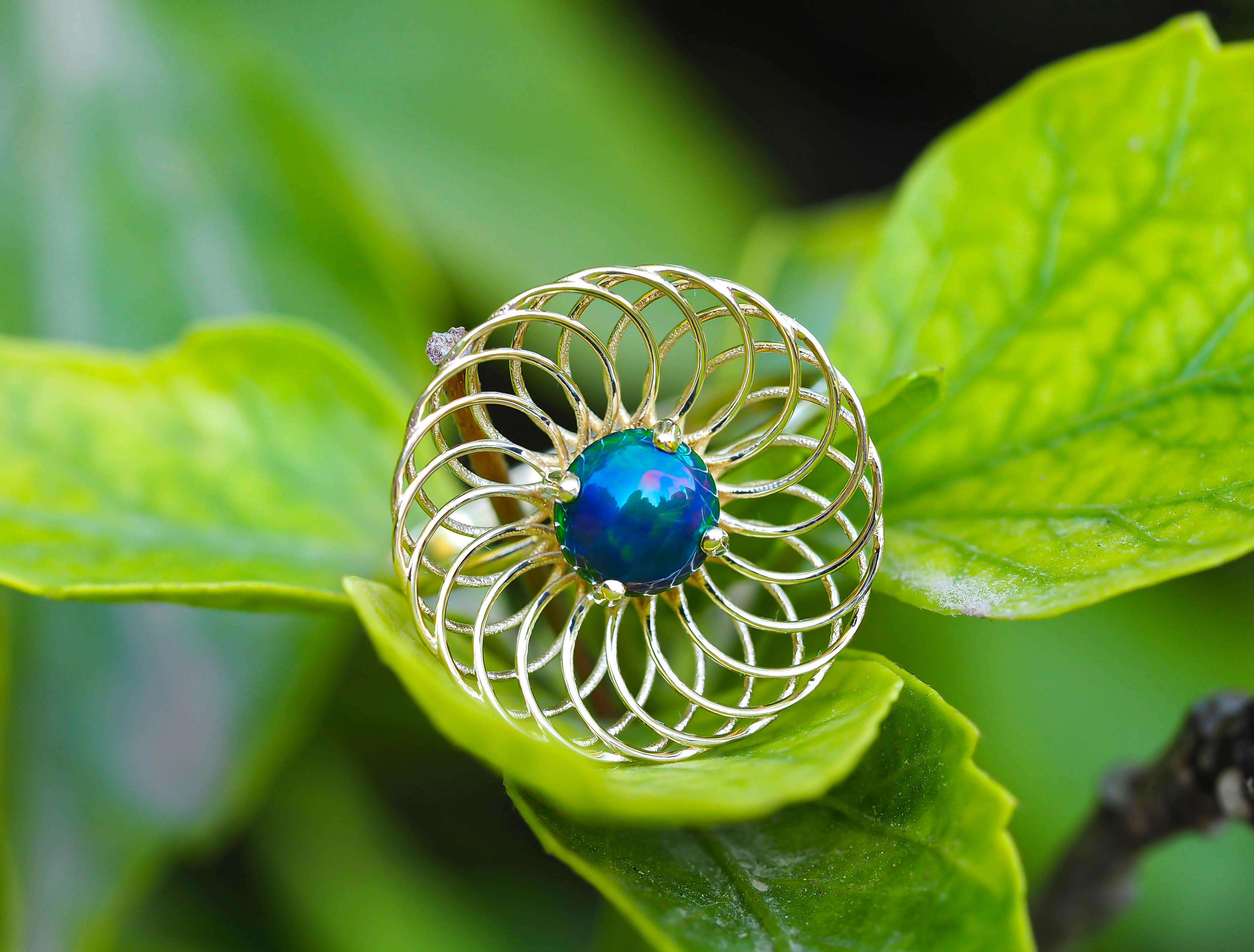 Round black opal ring in 14k gold. 4
