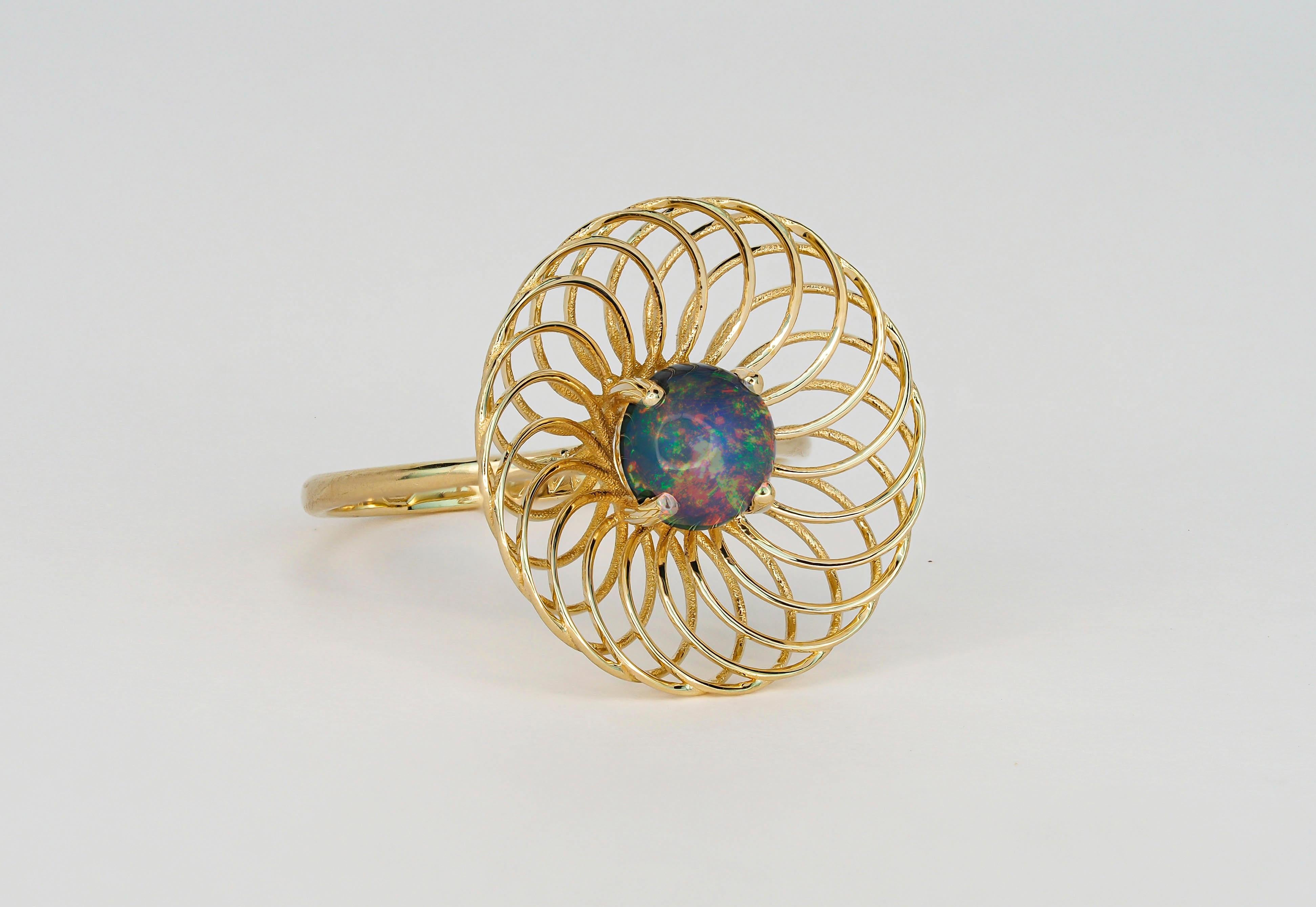 Round black opal ring in 14k gold. 
Opal gold ring. Geometric opal ring. Dainty colorful opal ring. Unique Floral Ring. Ethiopian opal ring.

Metal: 14k gold
Weight 2.00 g. depends from size

Gemstones:
Central stone: Natural opal
Cut: round