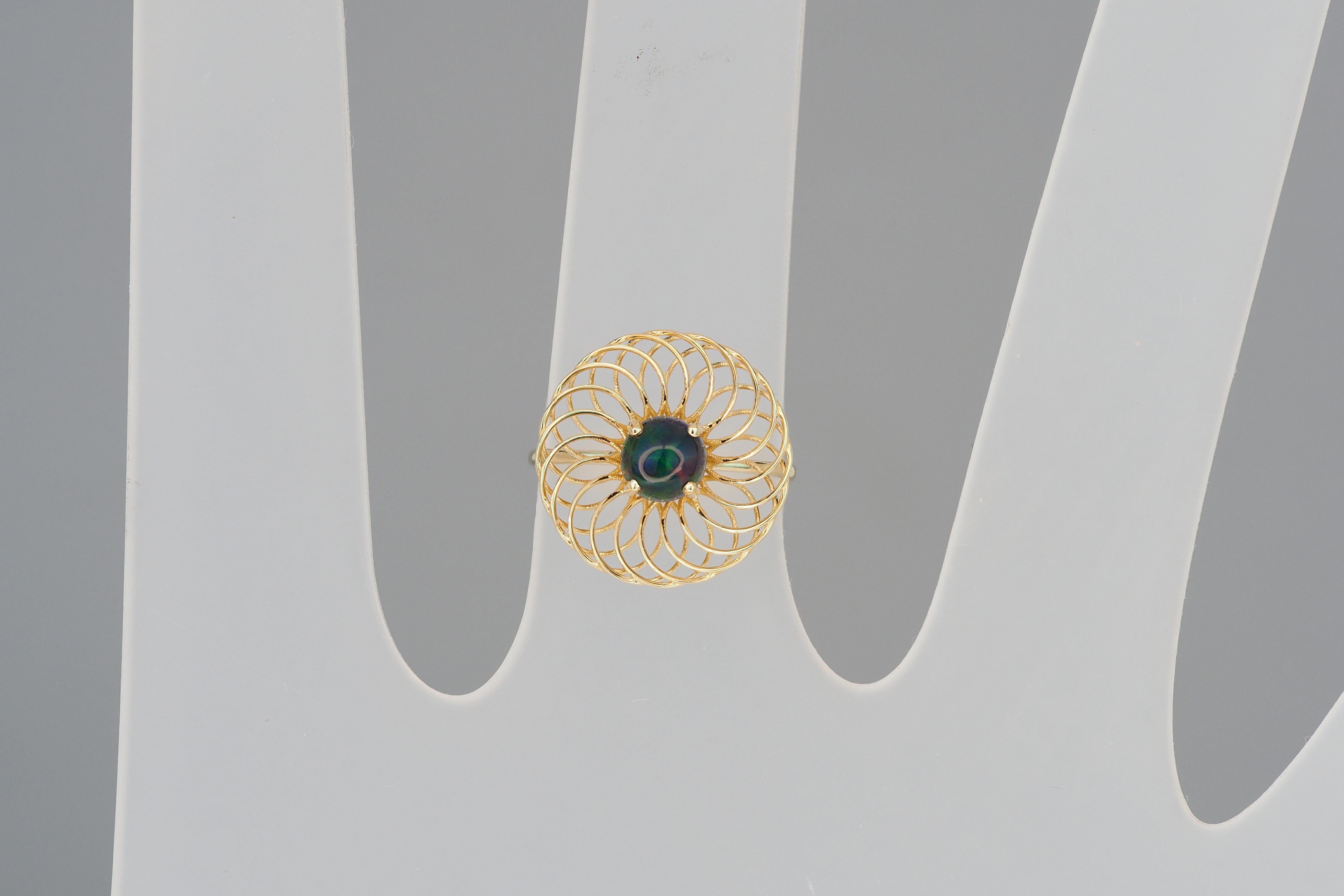 Modern Round black opal ring in 14k gold. 