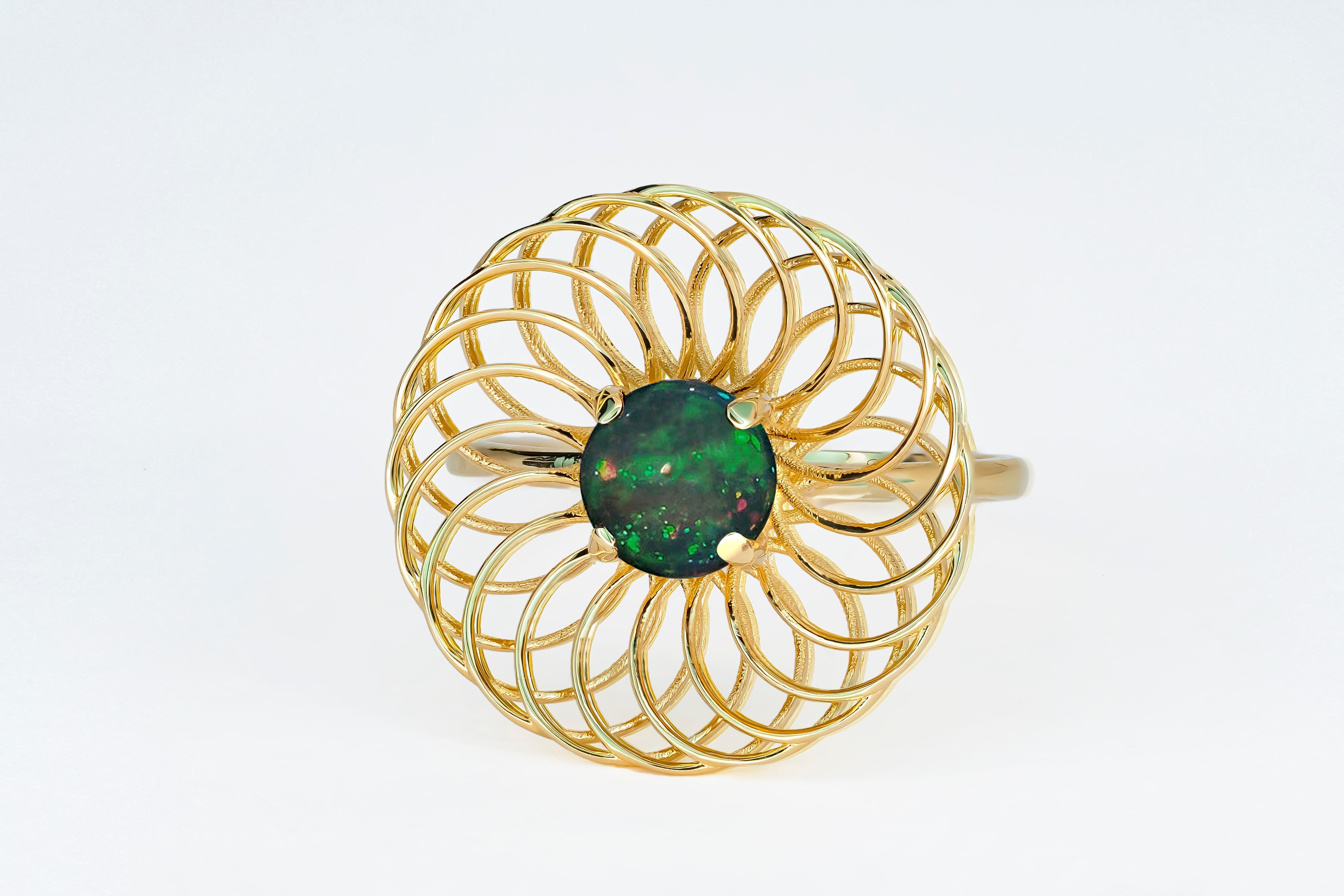 Round black opal ring in 14k gold.  In New Condition In Istanbul, TR