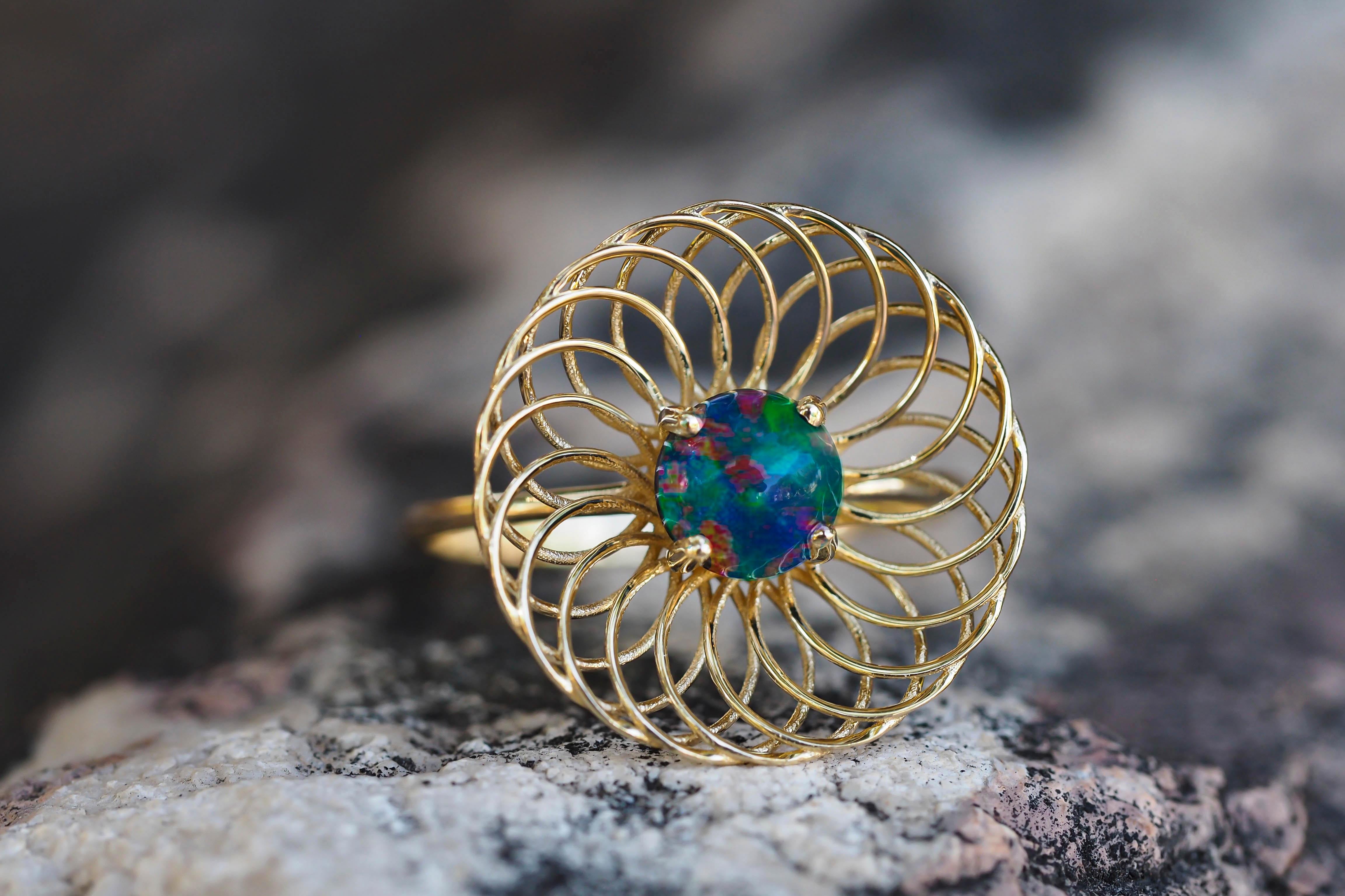 Round black opal ring in 14k gold.  3
