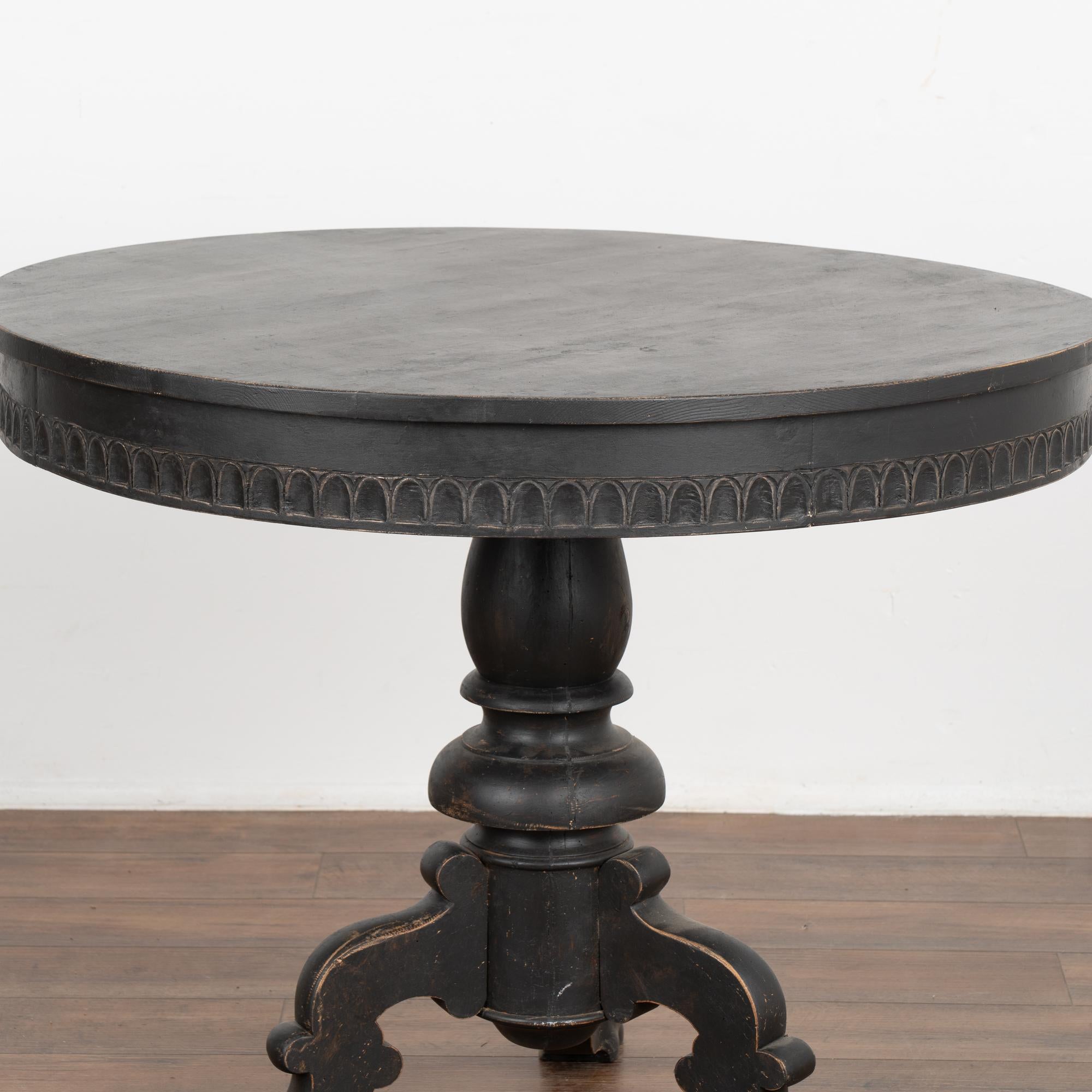 round black pedestal side table