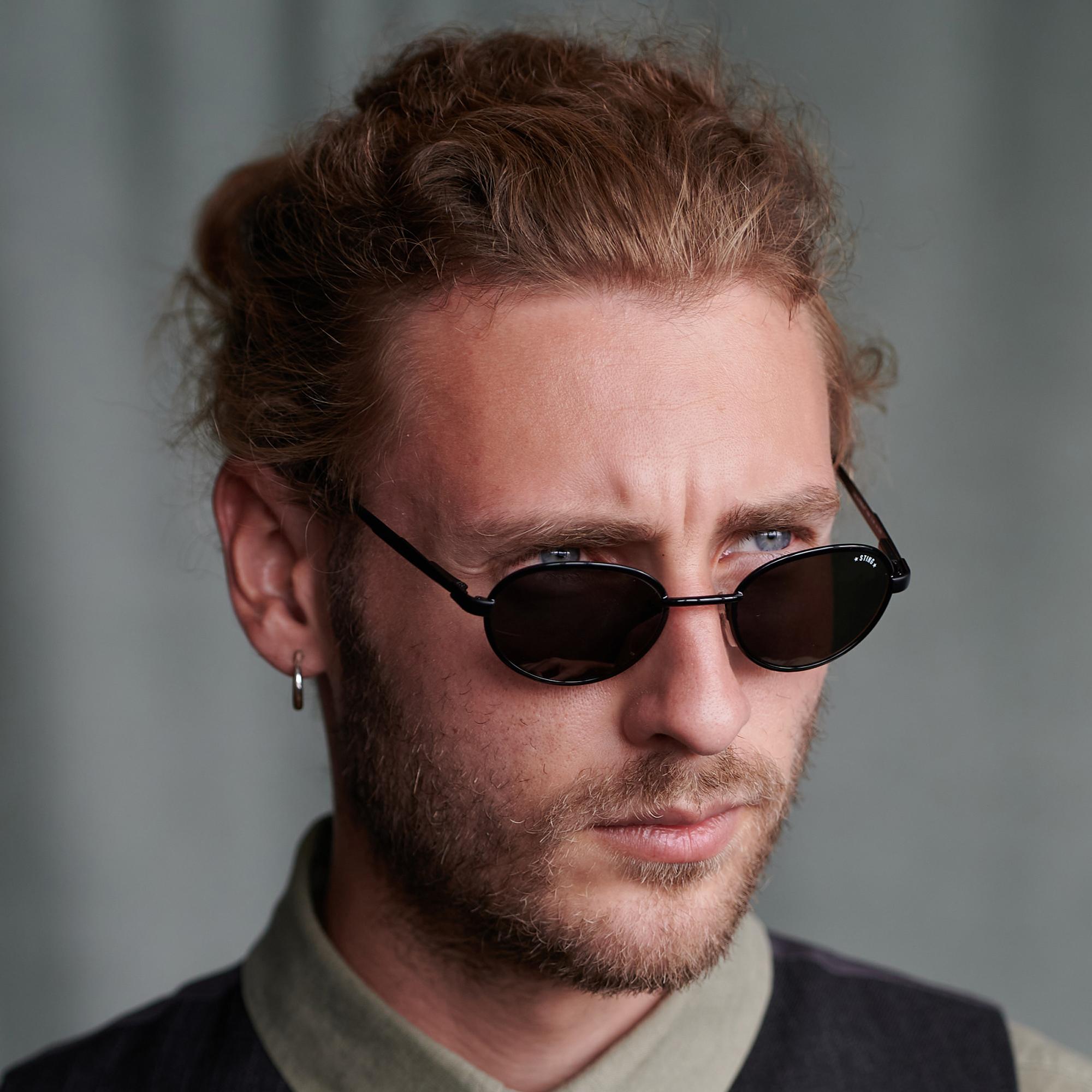 Lunettes de soleil rondes noires de Sting, Italie Unisexe en vente