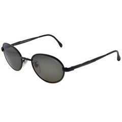 Round black sunglasses by Sting, Italy 