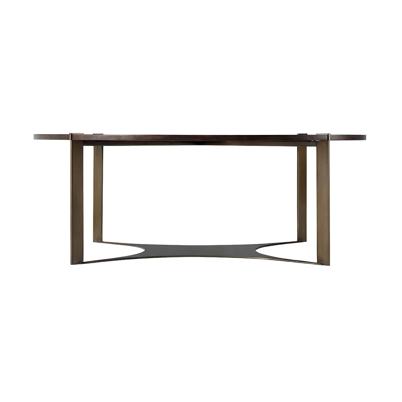 A round blade leg coffee table with a concave-sided platform base. The cherry veneer circular top has an 