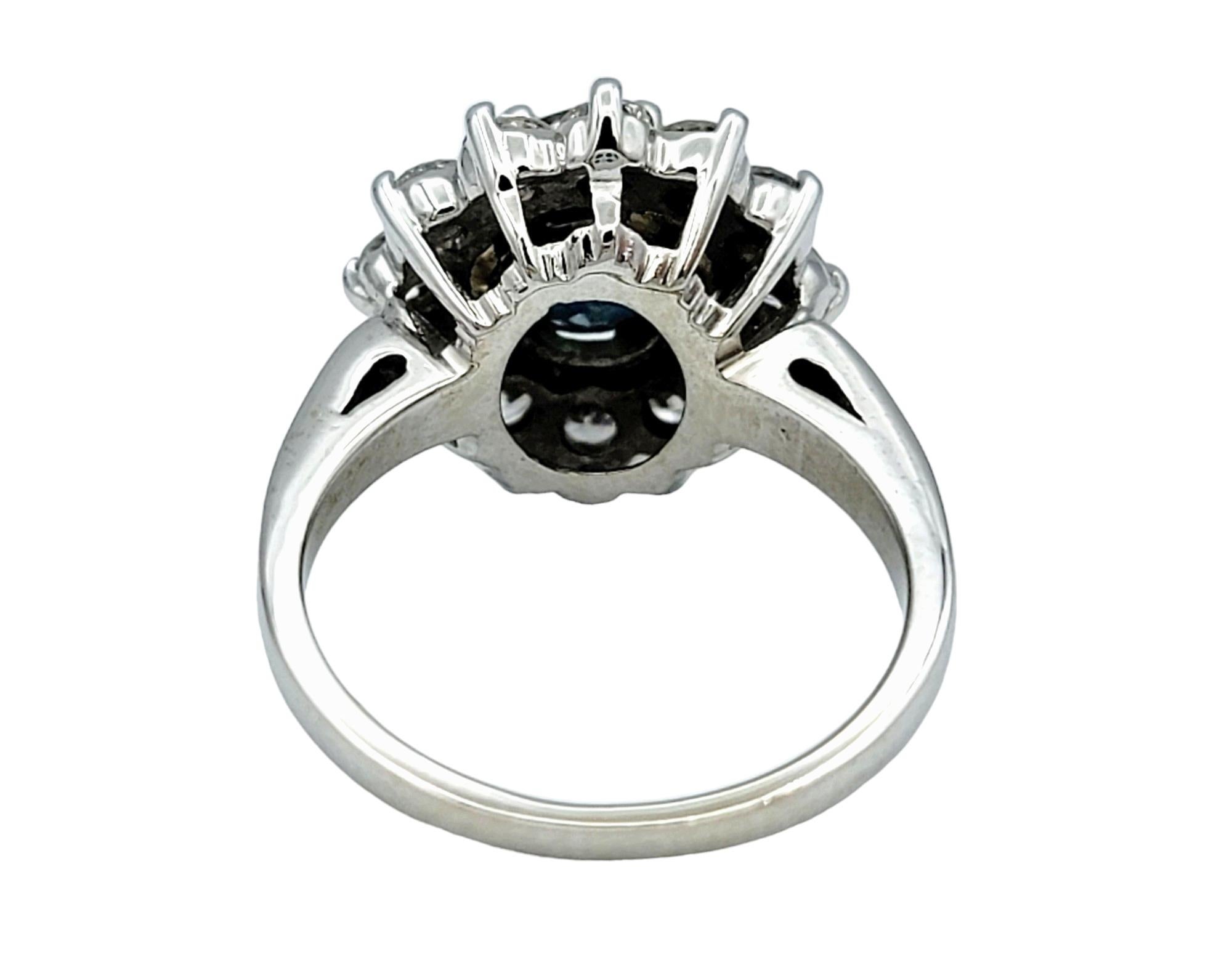 Round Cut Round Blue Sapphire and Diamond Halo Flower Cocktail Ring in 14 Karat White Gold For Sale