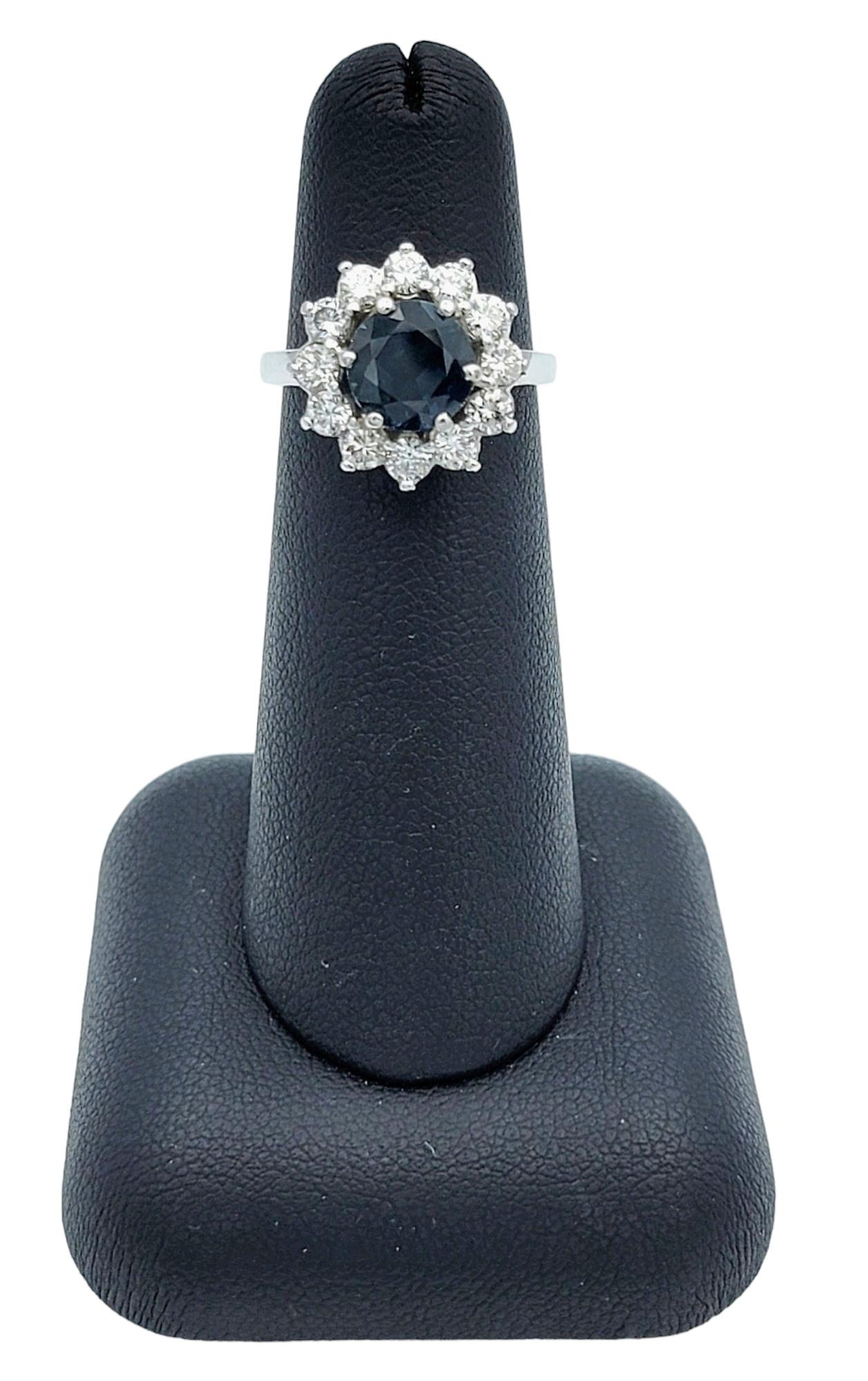 Round Blue Sapphire and Diamond Halo Flower Cocktail Ring in 14 Karat White Gold For Sale 1