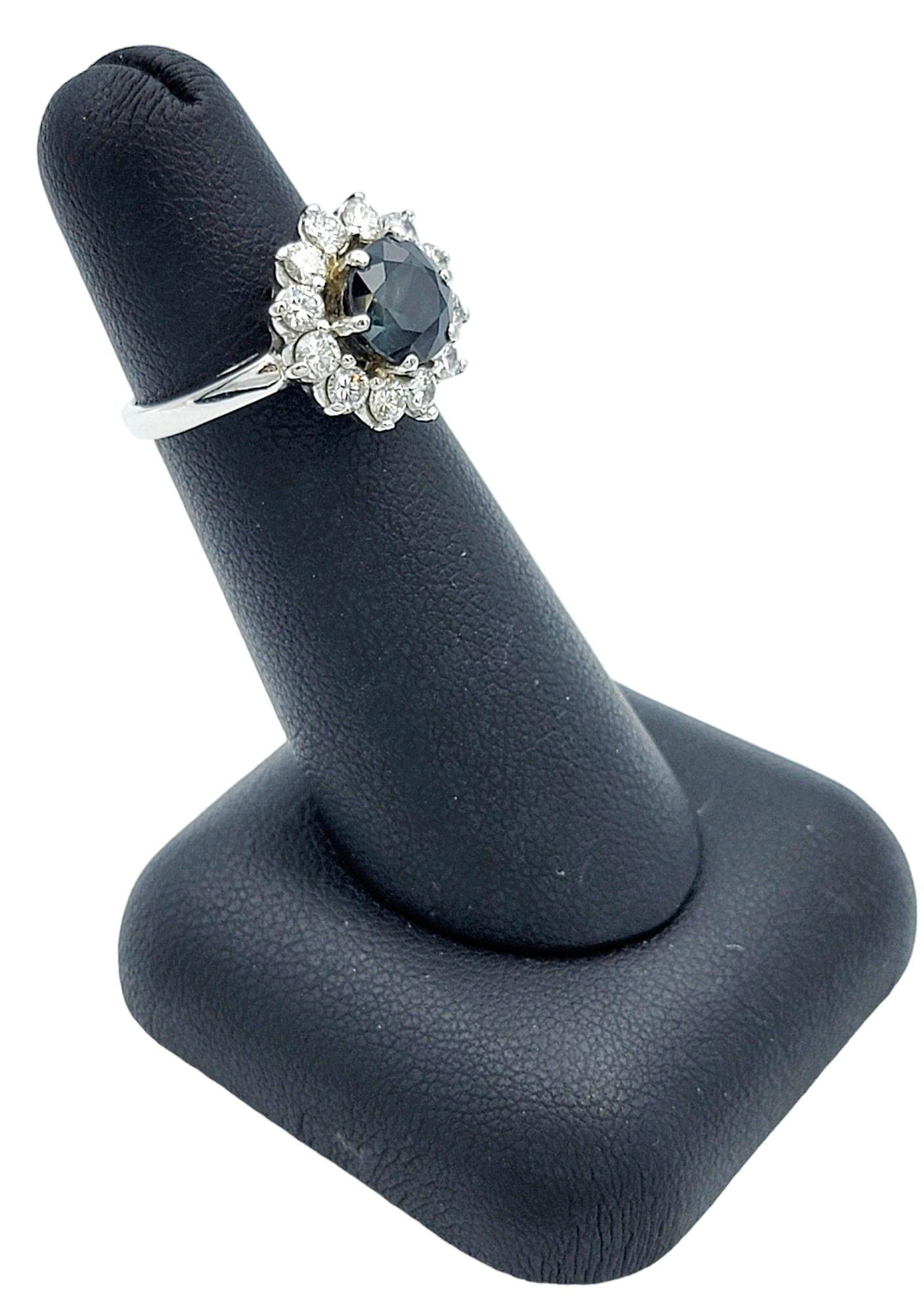 Round Blue Sapphire and Diamond Halo Flower Cocktail Ring in 14 Karat White Gold For Sale 2