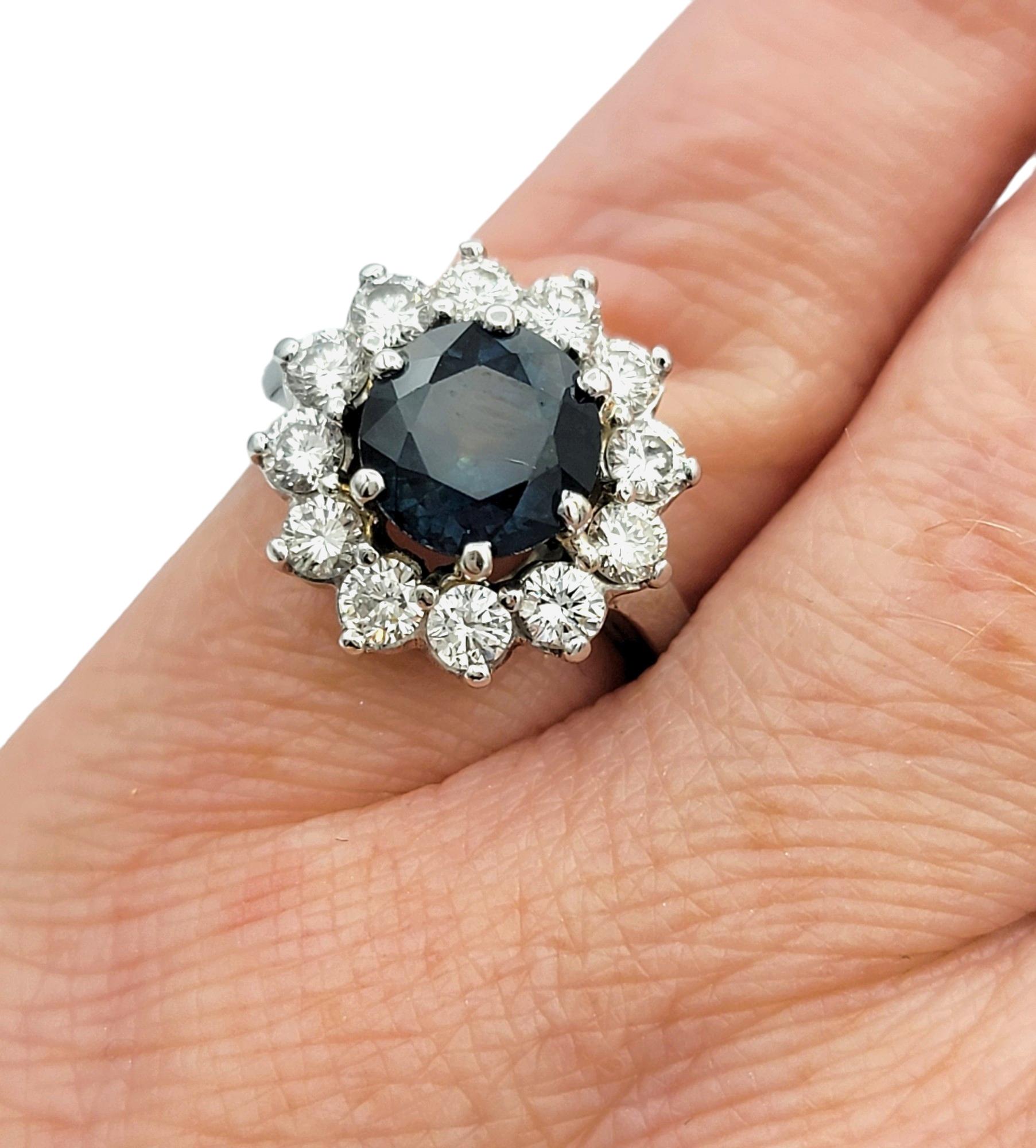 Round Blue Sapphire and Diamond Halo Flower Cocktail Ring in 14 Karat White Gold For Sale 3