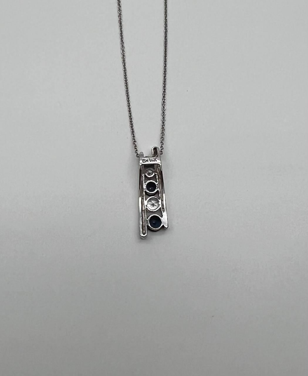Modern Round Blue Sapphire & Diamonds Tension Set 14K White Gold Pendant Necklace For Sale
