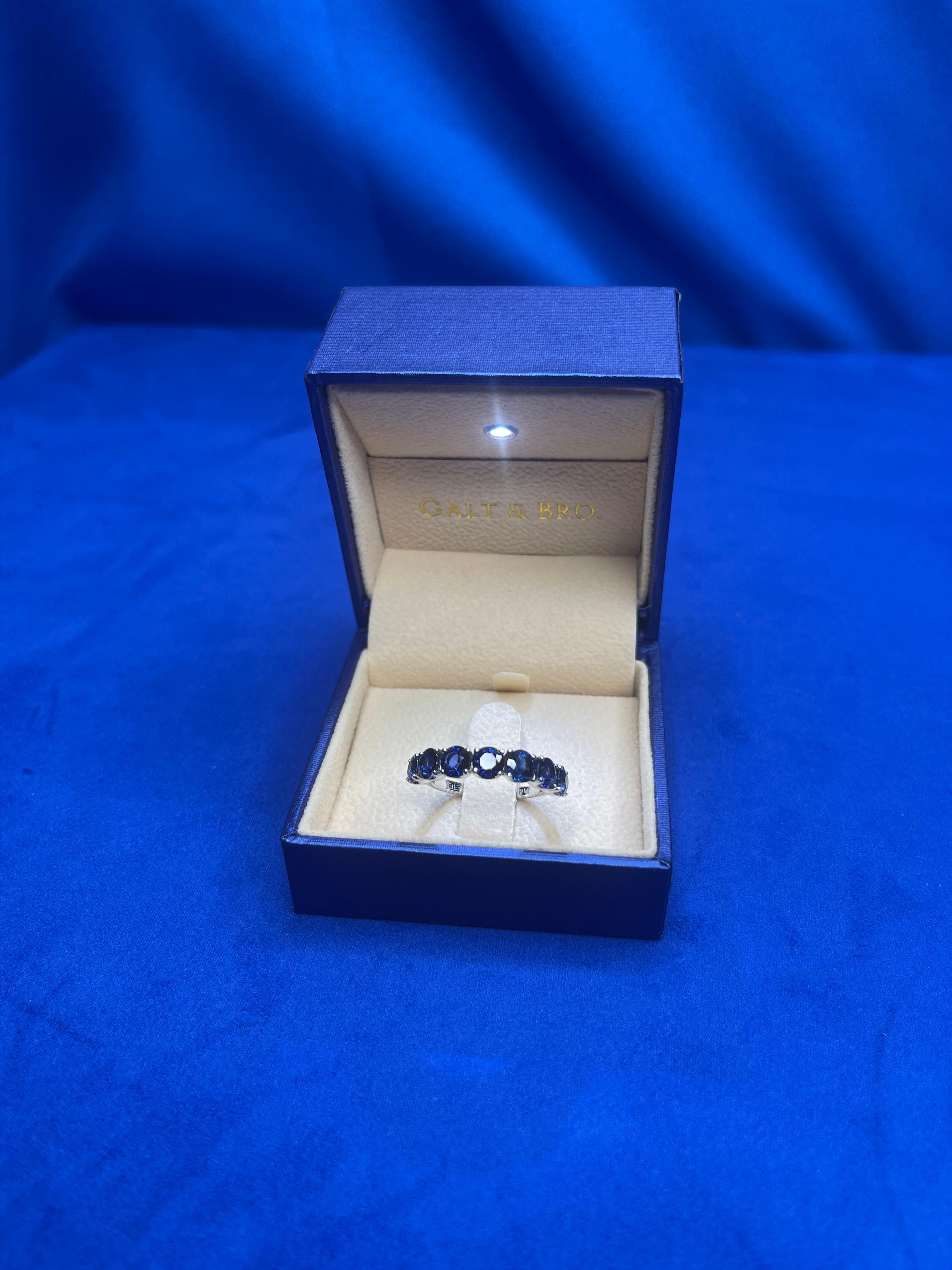 Round Blue Sapphire Eternity Anniversary Wedding Band 14 Karat White Gold Ring For Sale 1