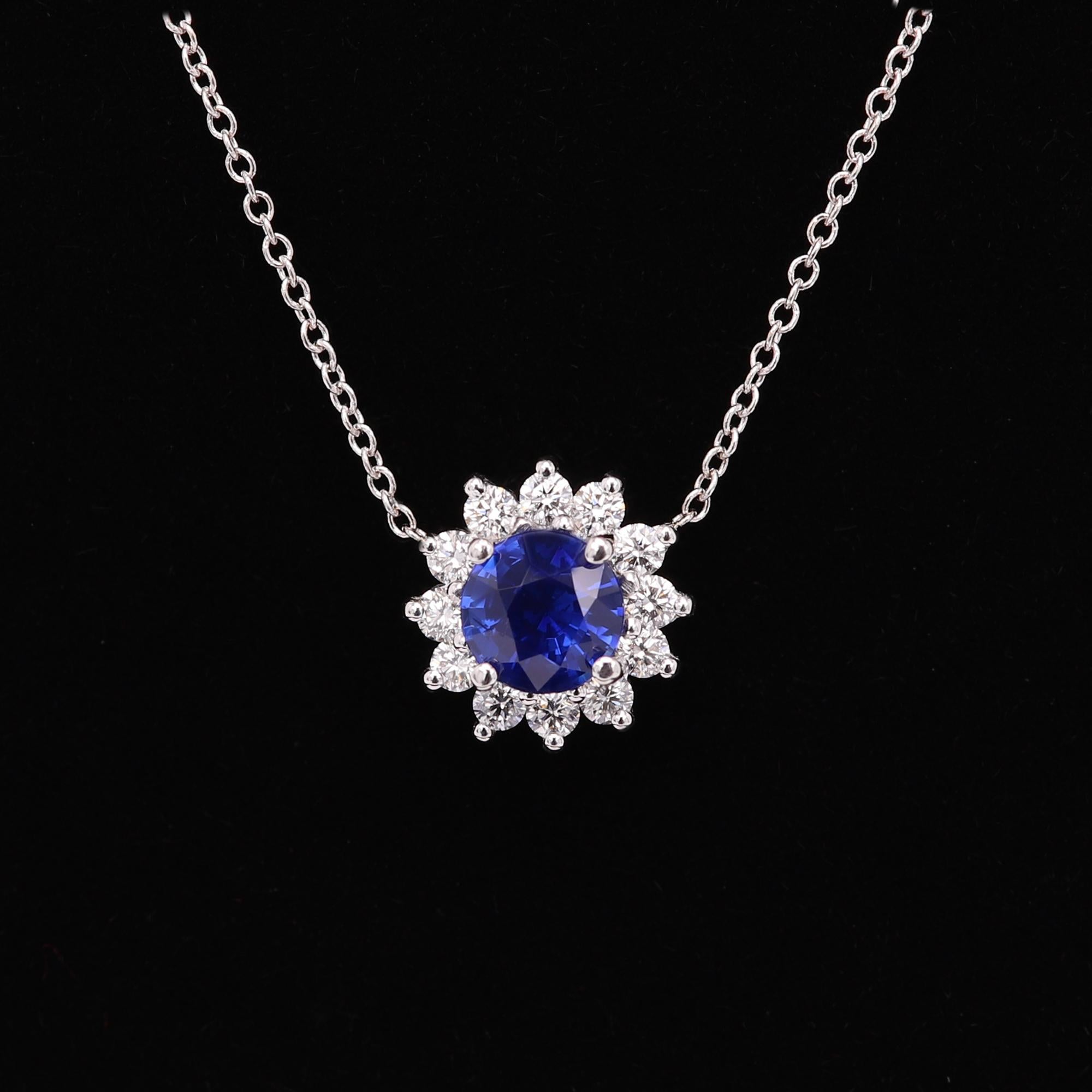 A true brilliant pendant necklace jewelry 
With a unique round blue sapphire approx size 1.00 carat (6.0 mm) AAA
The sapphire is a Natural common heated with a deep Blue color and Good Luster.  
The round shape sapphire is an uncommon shape for