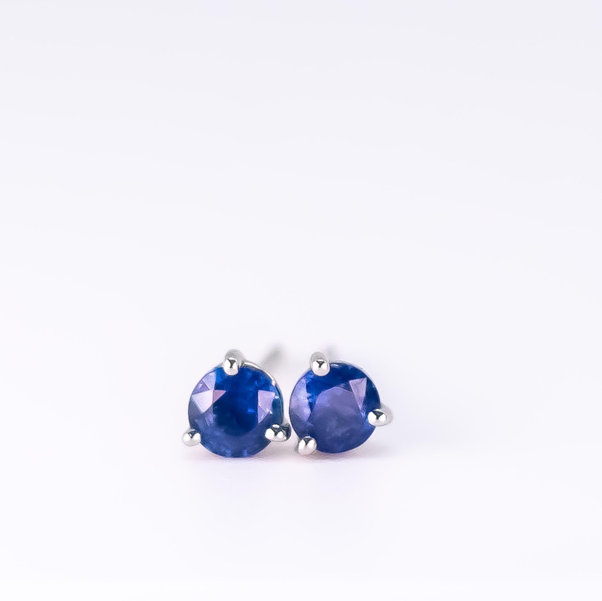 Beautiful round blue sapphire studs set in Platinum. 

These Ceylon sapphires are a stunning blue colour and medium tone, not too light and not too dar. The studs are set in a three prong martini setting with a butterfly push back. 

The blue