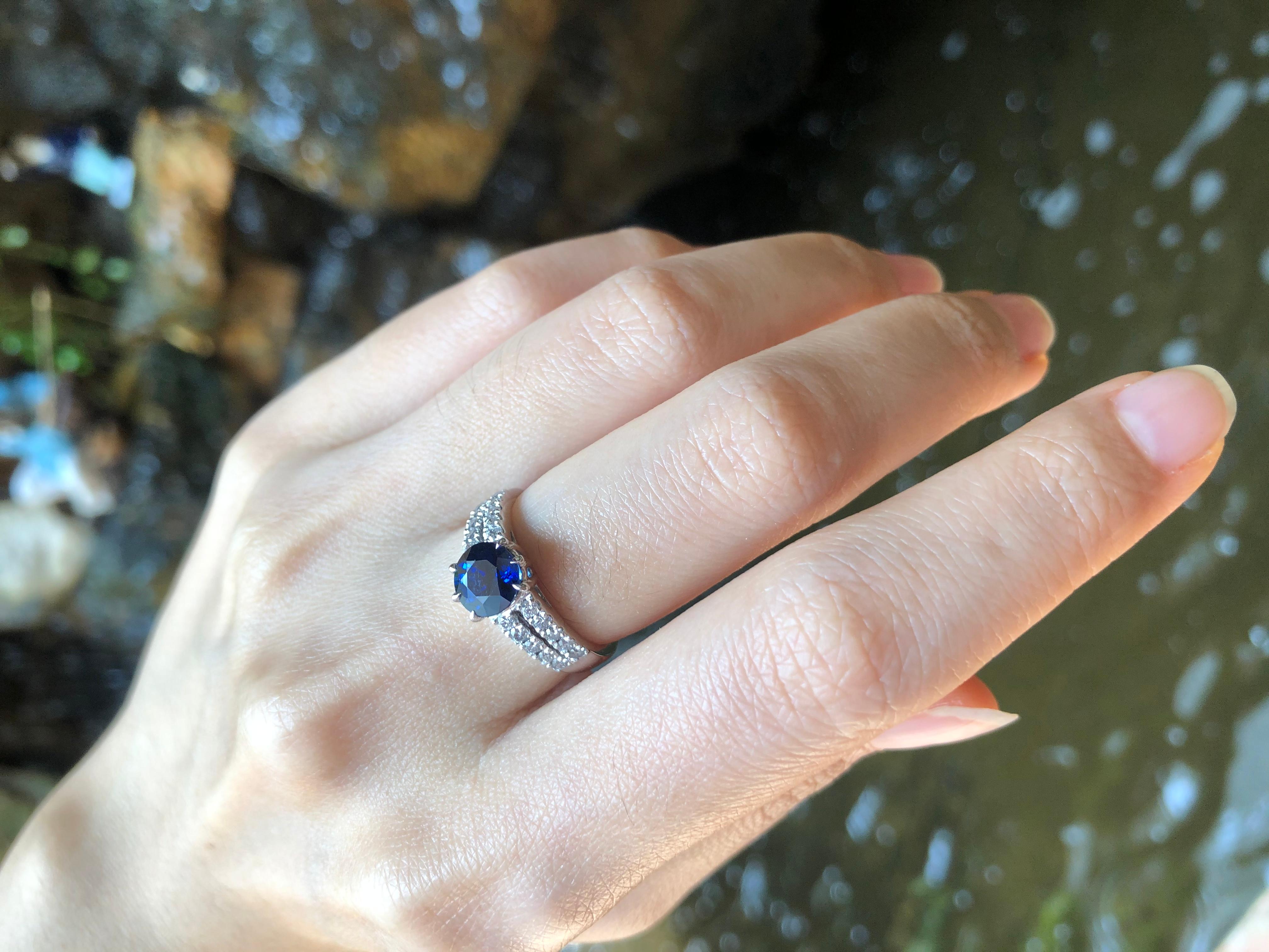 Contemporary Round Blue Sapphire with Diamond Ring Set in Platinum 950 Settings For Sale