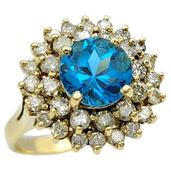 Round Blue Topaz and Double Diamond Halo Cocktail Ring in 18 Karat Yellow Gold