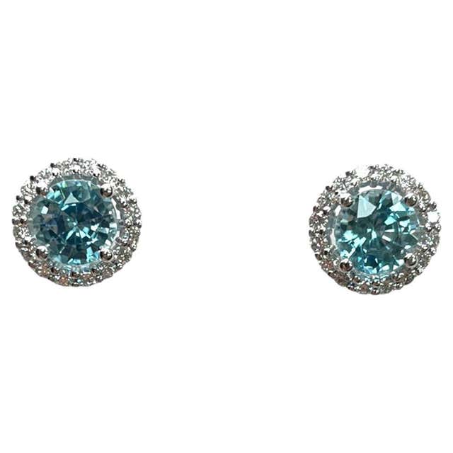 Blue Zircon and Diamond Halo Ring in 18K White Gold For Sale at 1stDibs