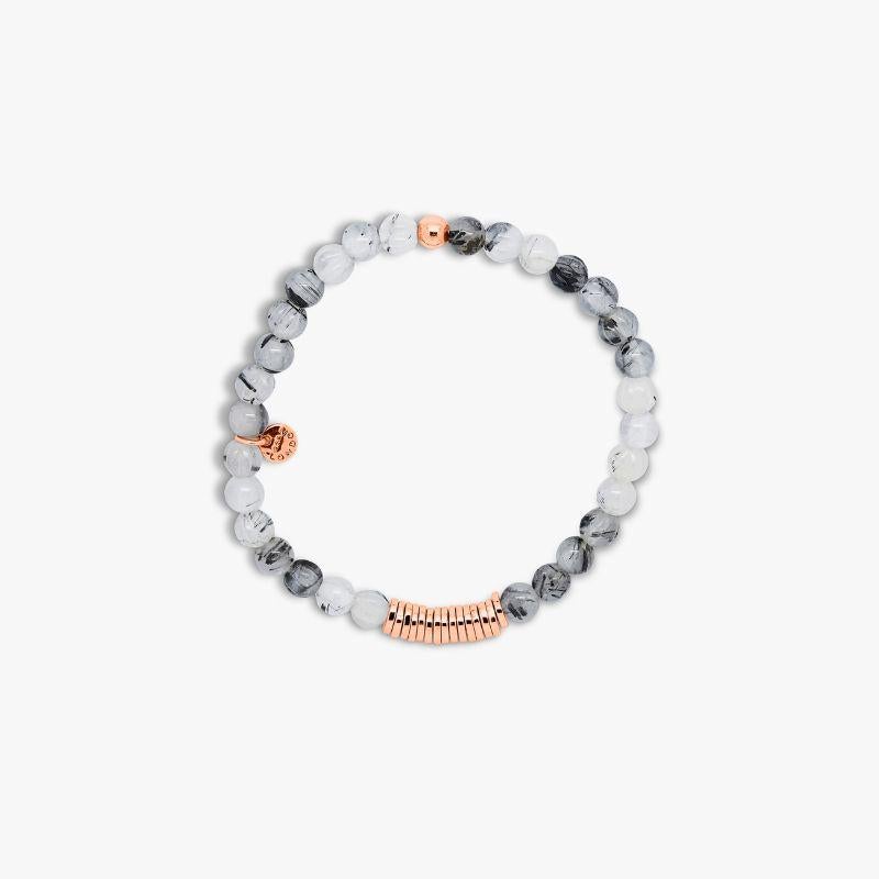 Discs Round bracelet with black rutilated quartz and rose gold plated sterling silver, Size XS

A series of bracelets featuring spherical semi-precious stone beads, separated by a group of irregularly finished 2 micron rose gold plated sterling