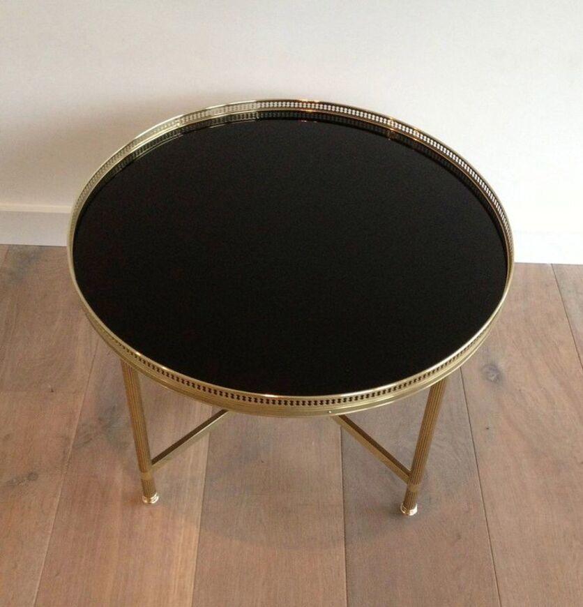 Neoclassical Round Brass Coffee Table with Black Lacquered Glass Top by Maison Jansen For Sale