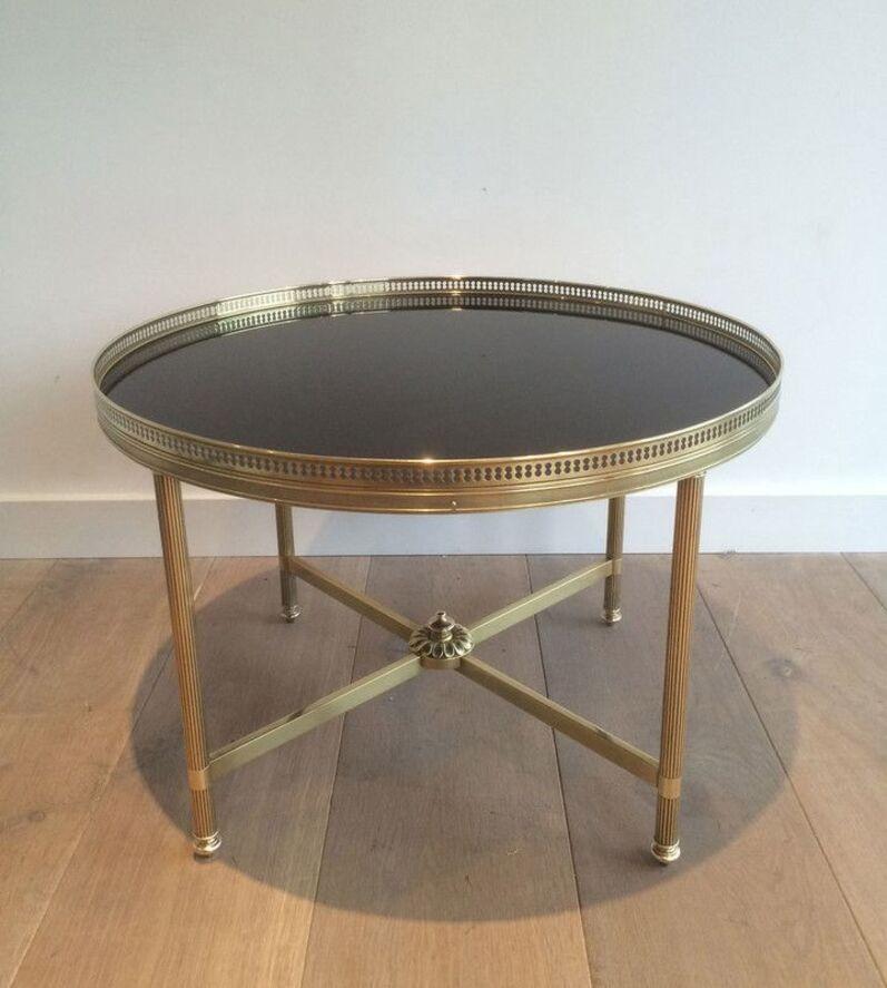 French Round Brass Coffee Table with Black Lacquered Glass Top by Maison Jansen For Sale