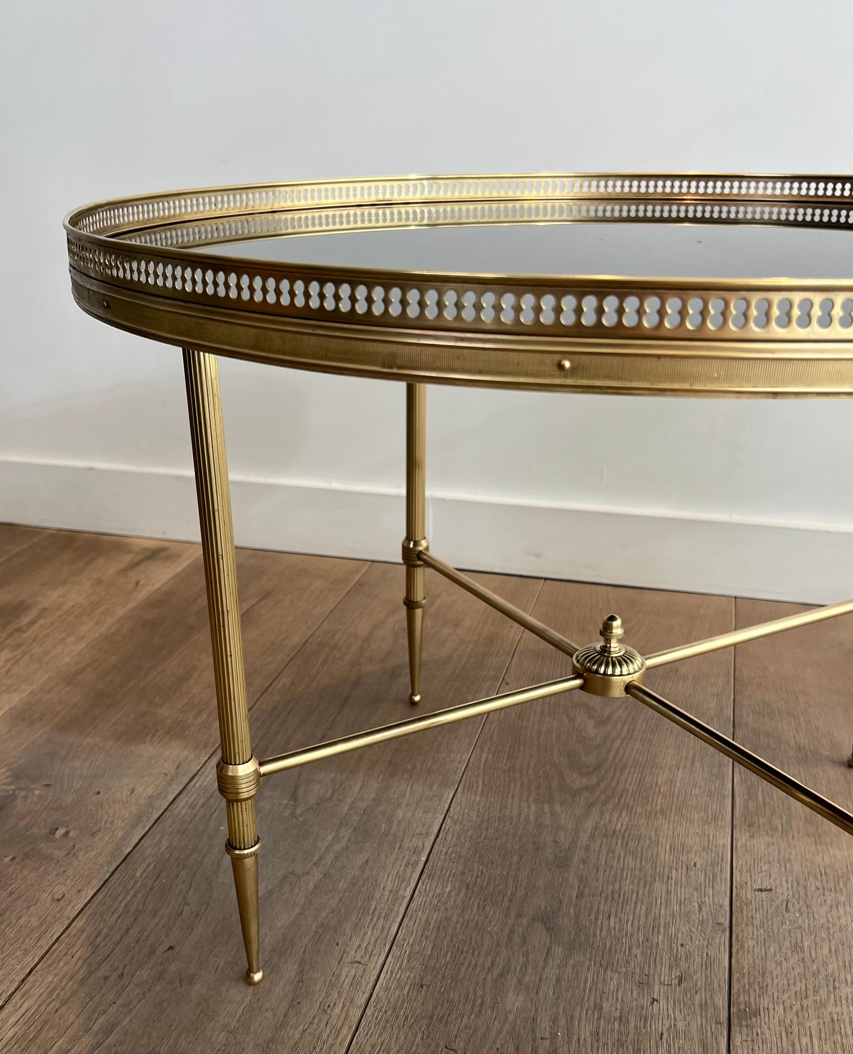 French Round Brass Coffee Table with Black Lacquered Glass Top by Maison Jansen For Sale