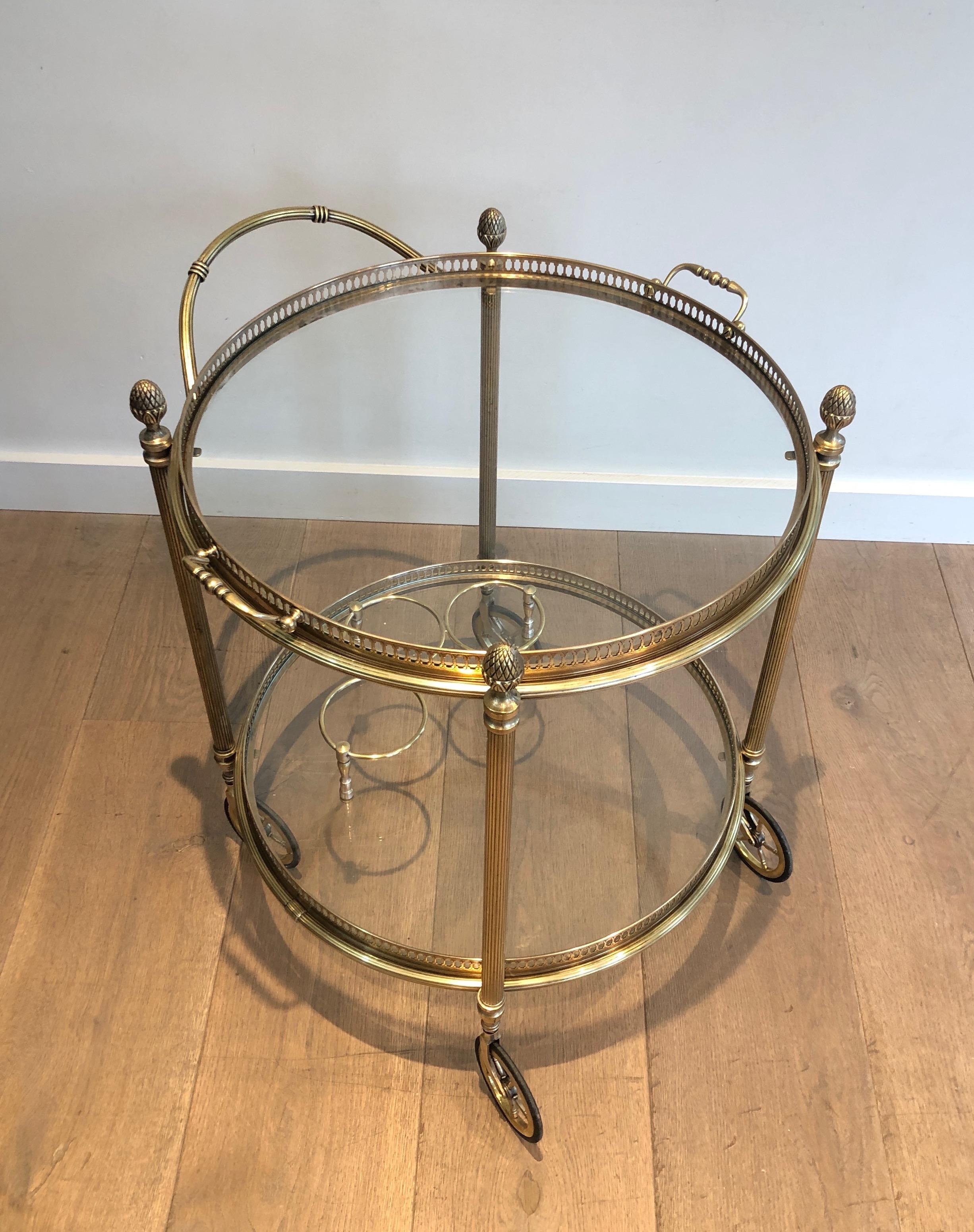 Neoclassical Style Round Brass Drinks Trolley with removable trays. French work by Maison Bagués. Circa 1940