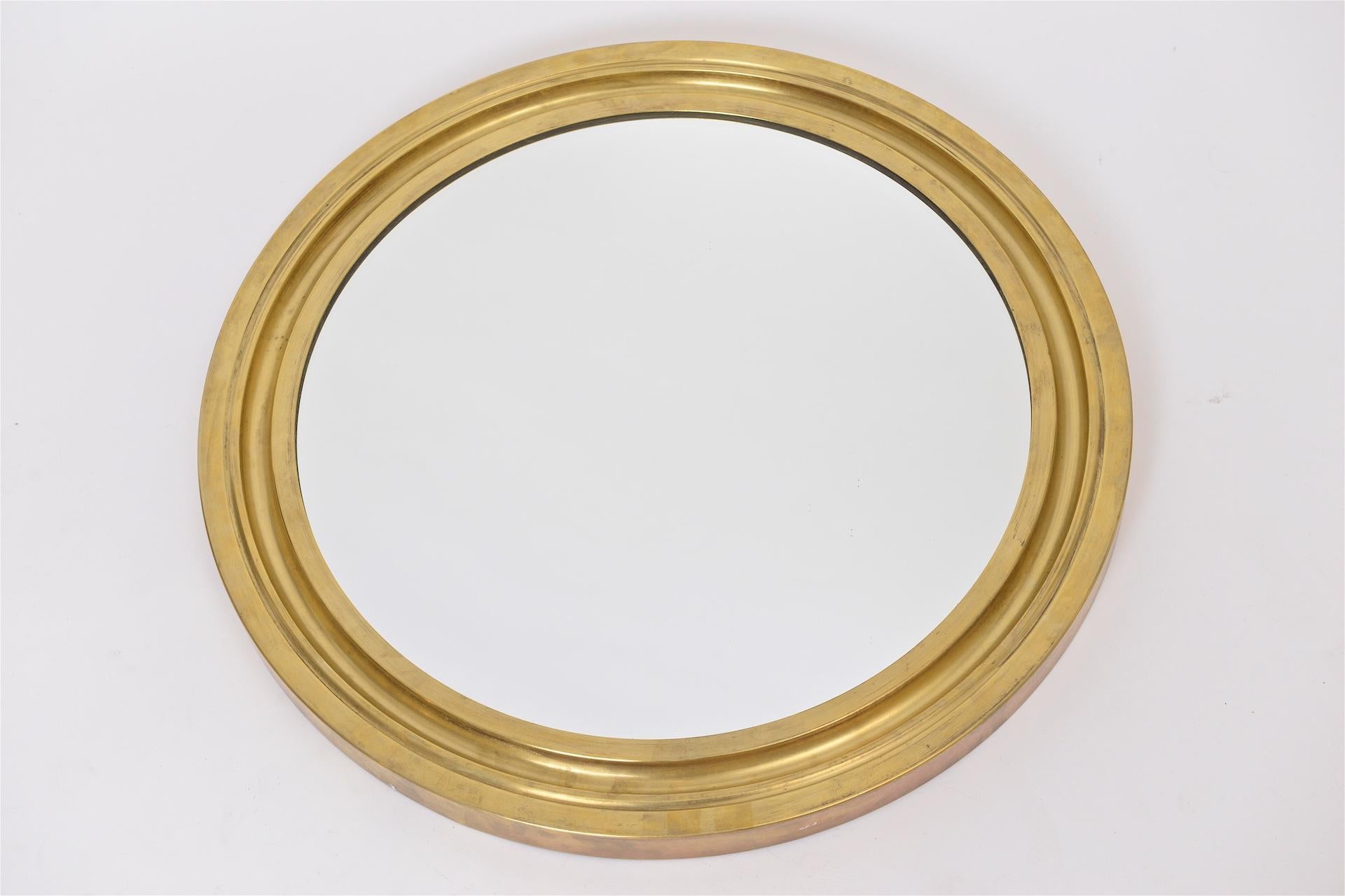 Italian round good quality brass frame mirror.
