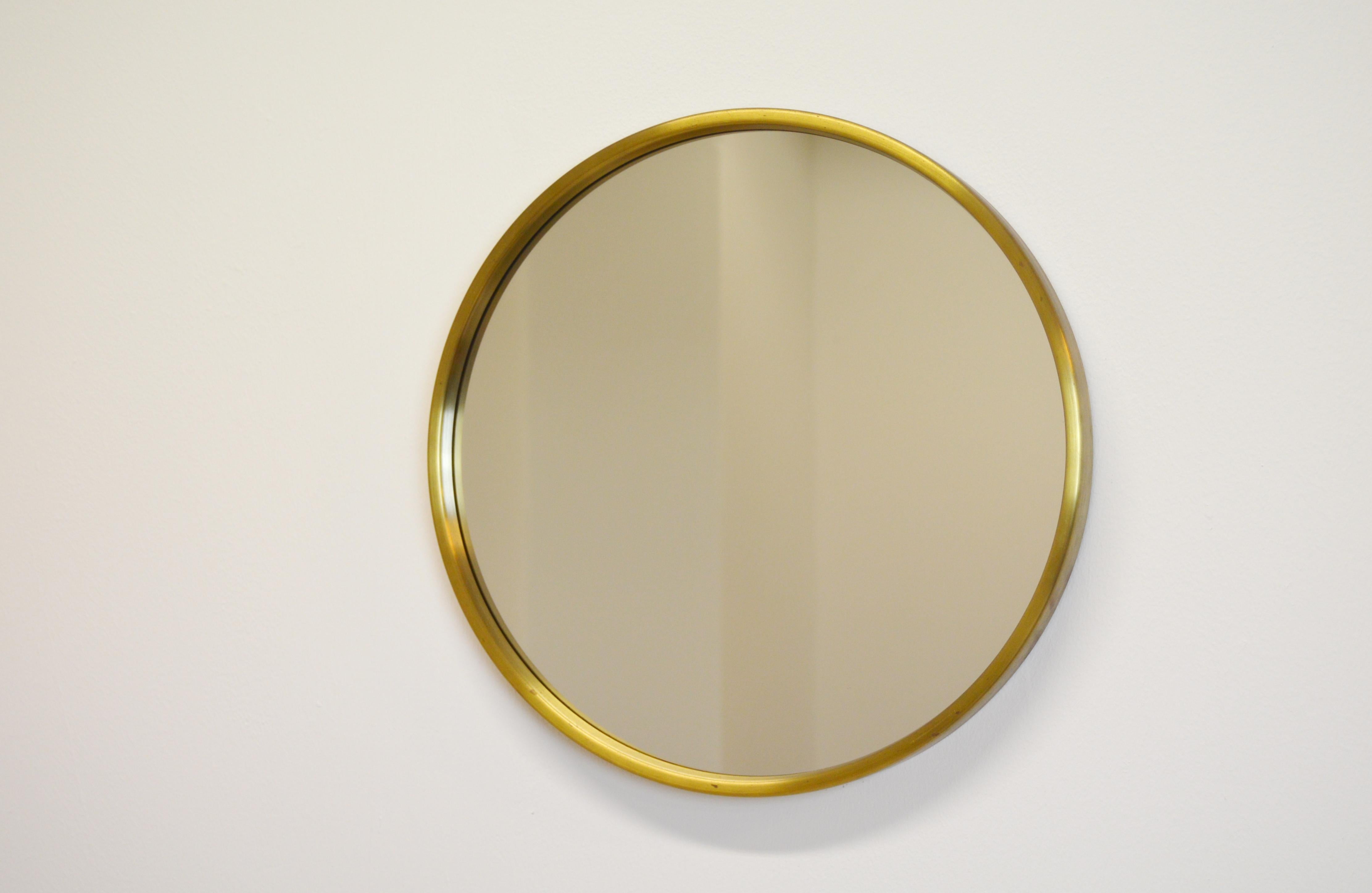 Nice brass mirror designed in Sweden by Glasmaster Markaryd.
  