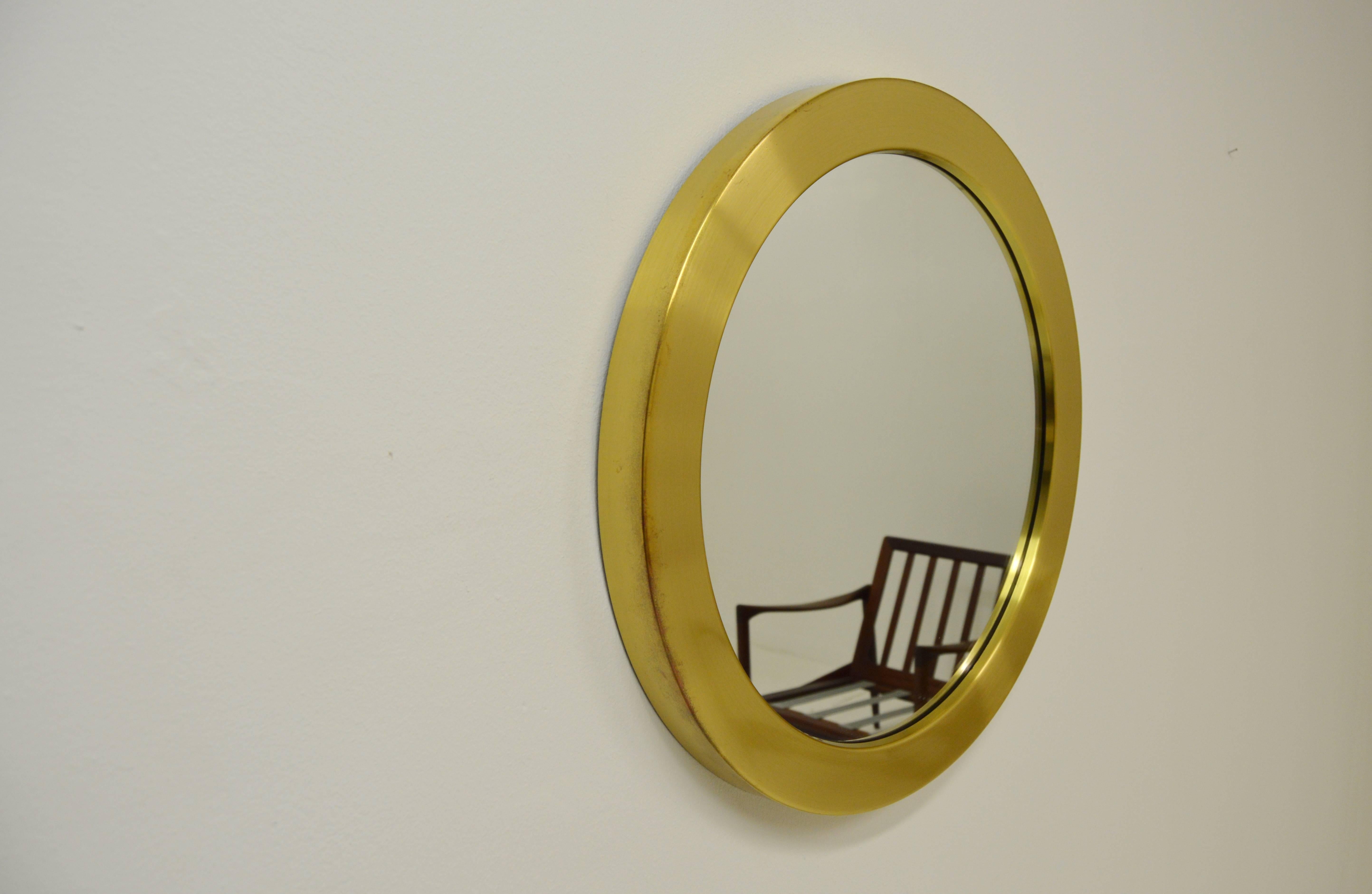 Nice brass mirror in very good vintage condition. Designed in Sweden by Glasmaster Markaryd.
 