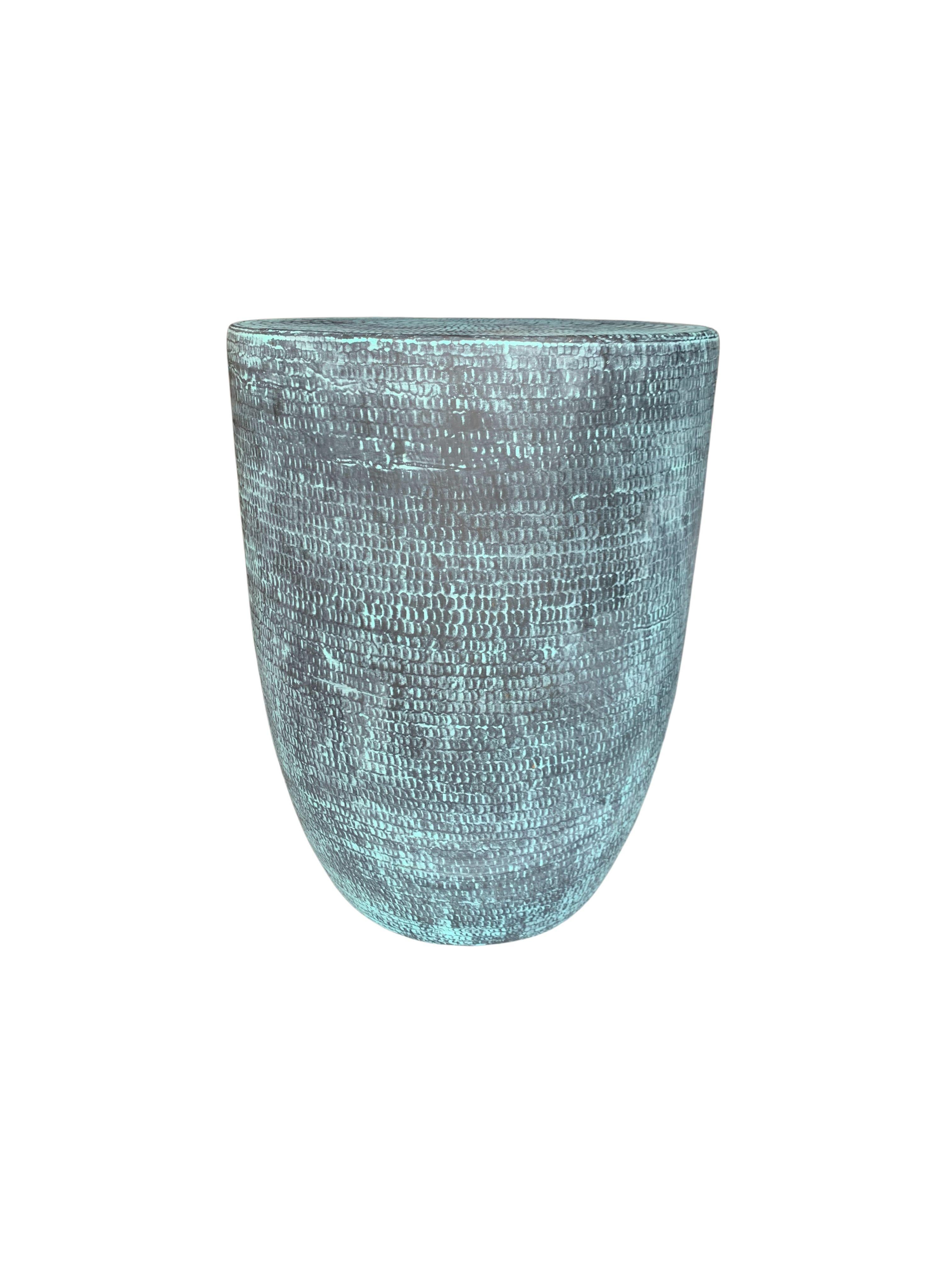 Hammered by hand this side table has a versatile aesthetic allowing it to mix easily with a wide range of spaces. The table is crafted from brass and features this wonderful detailing on all sides.