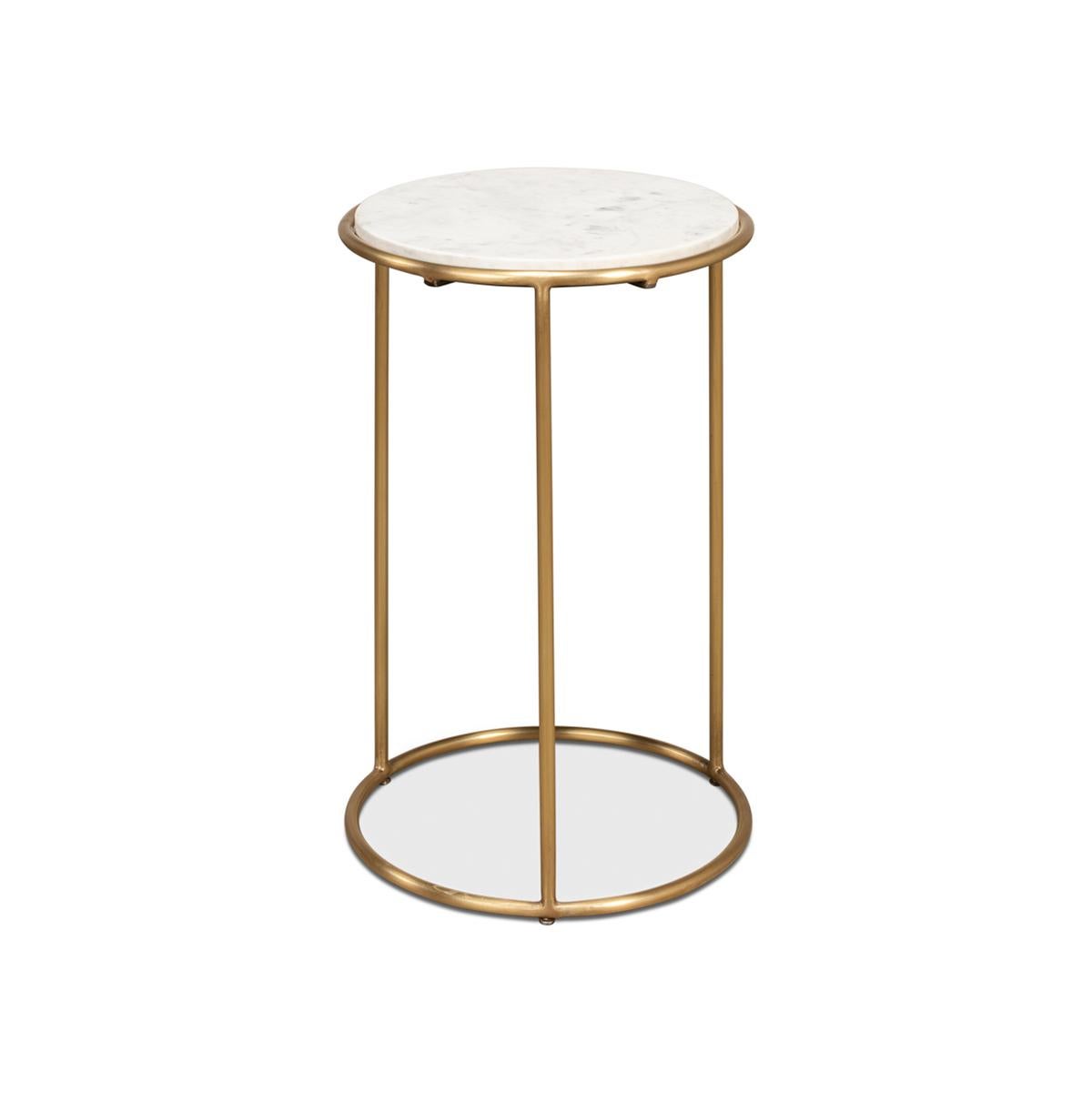 With an inset white marble top, and a brass modern open cylindrical form base.

Dimensions: 14