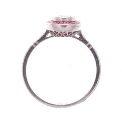 Round Brilliant 0.65 Carat Diamond Ruby Platinum Engagement Ring