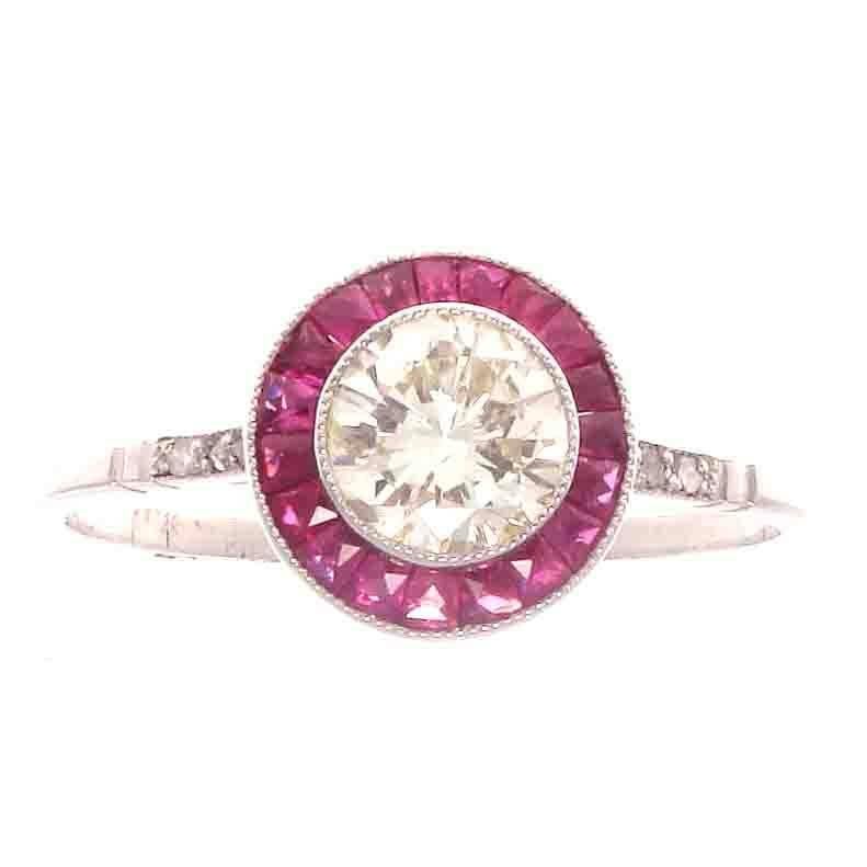 Round Brilliant 0.65 Carat Diamond Ruby Platinum Engagement Ring