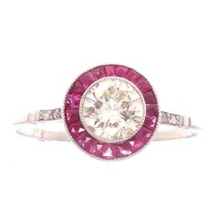 Round Brilliant 0.65 Carat Diamond Ruby Platinum Engagement Ring